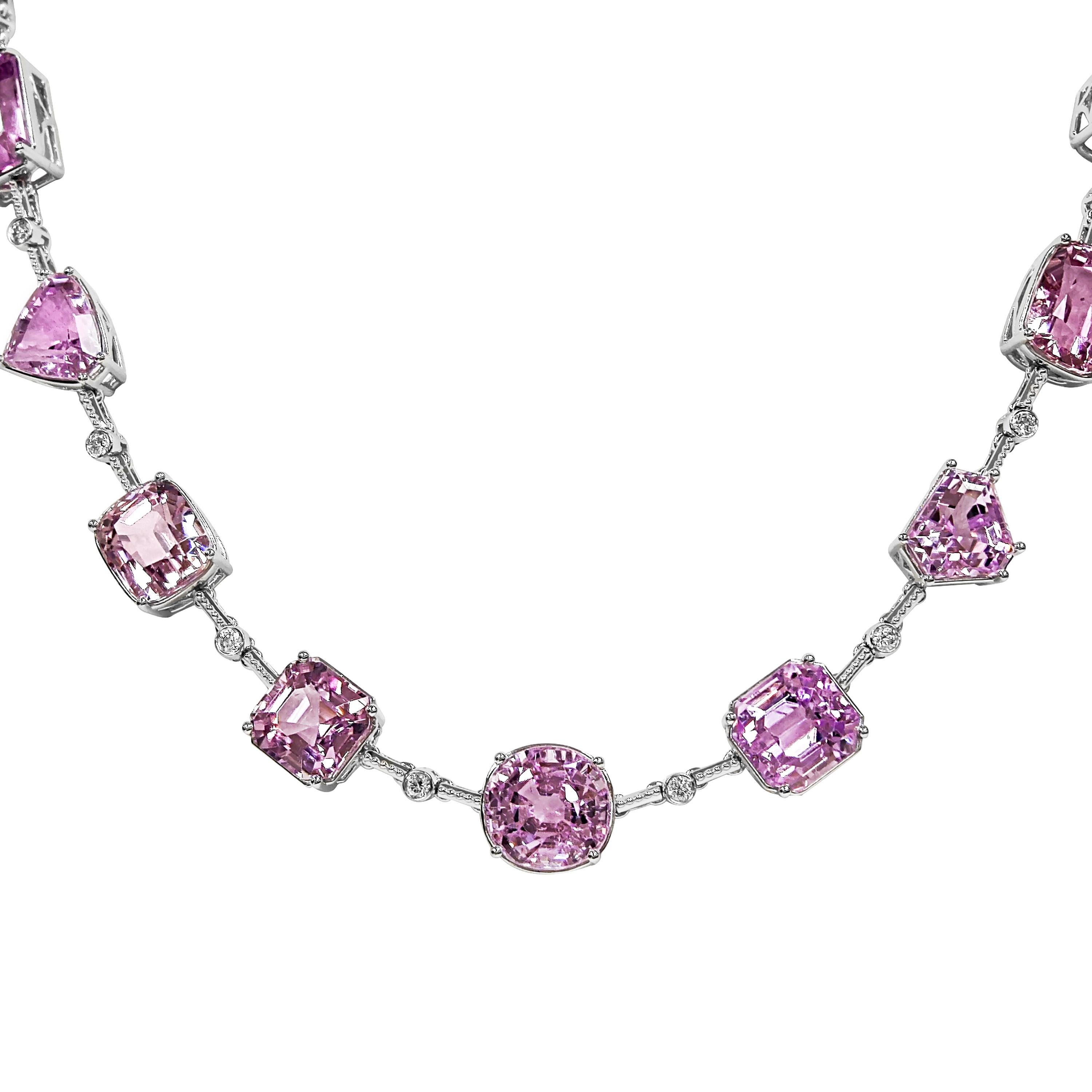 18 Kunzite Gemstones: 120.31 Carats
19 White Diamonds: 0.99 Carat, Round Cut
Metal: 18K White Gold, 47.60 Grams