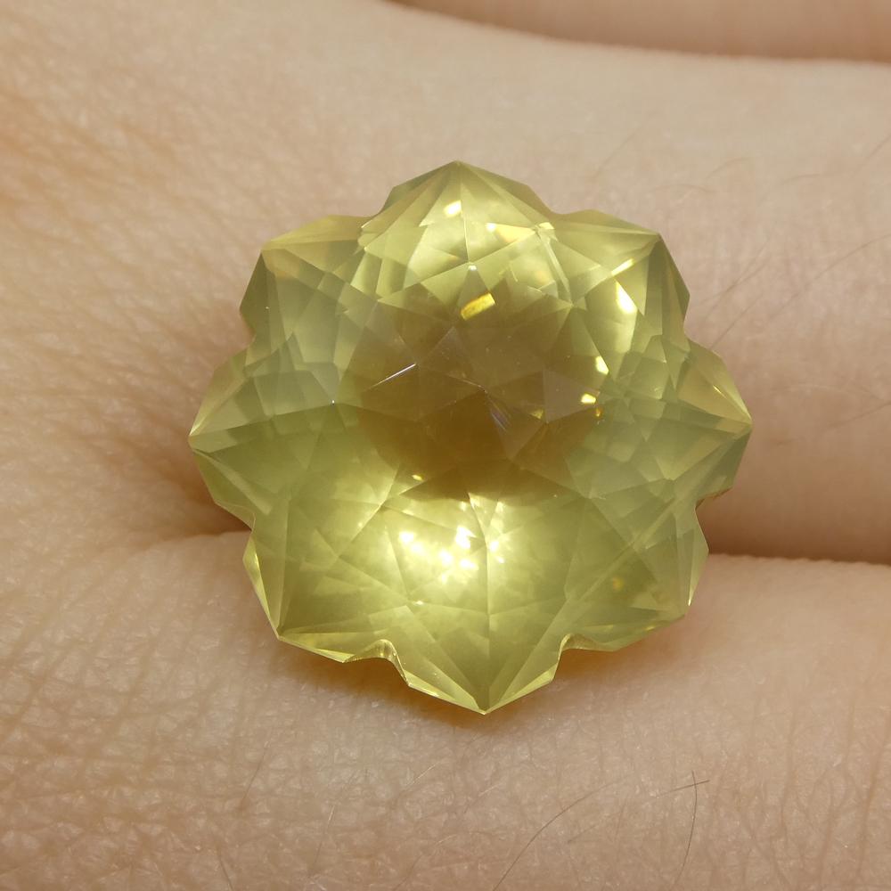 Description:

Gem Type: Lemon Citrine
Number of Stones: 1
Weight: 12.13cts
Measurements: 14.60x14.60x11mm
Shape: Flower
Cutting Style: Fantasy Cut
Cutting Style Crown: Modified Brilliant
Cutting Style Pavilion: Mixed Cut
Transparency: