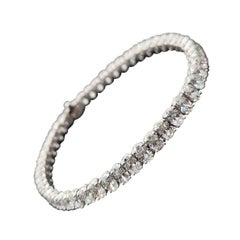 Bracelet de tennis avec diamant ovale de 12,15 ct