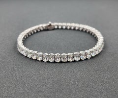 Bracelet de tennis avec diamant ovale de 12,15 ct