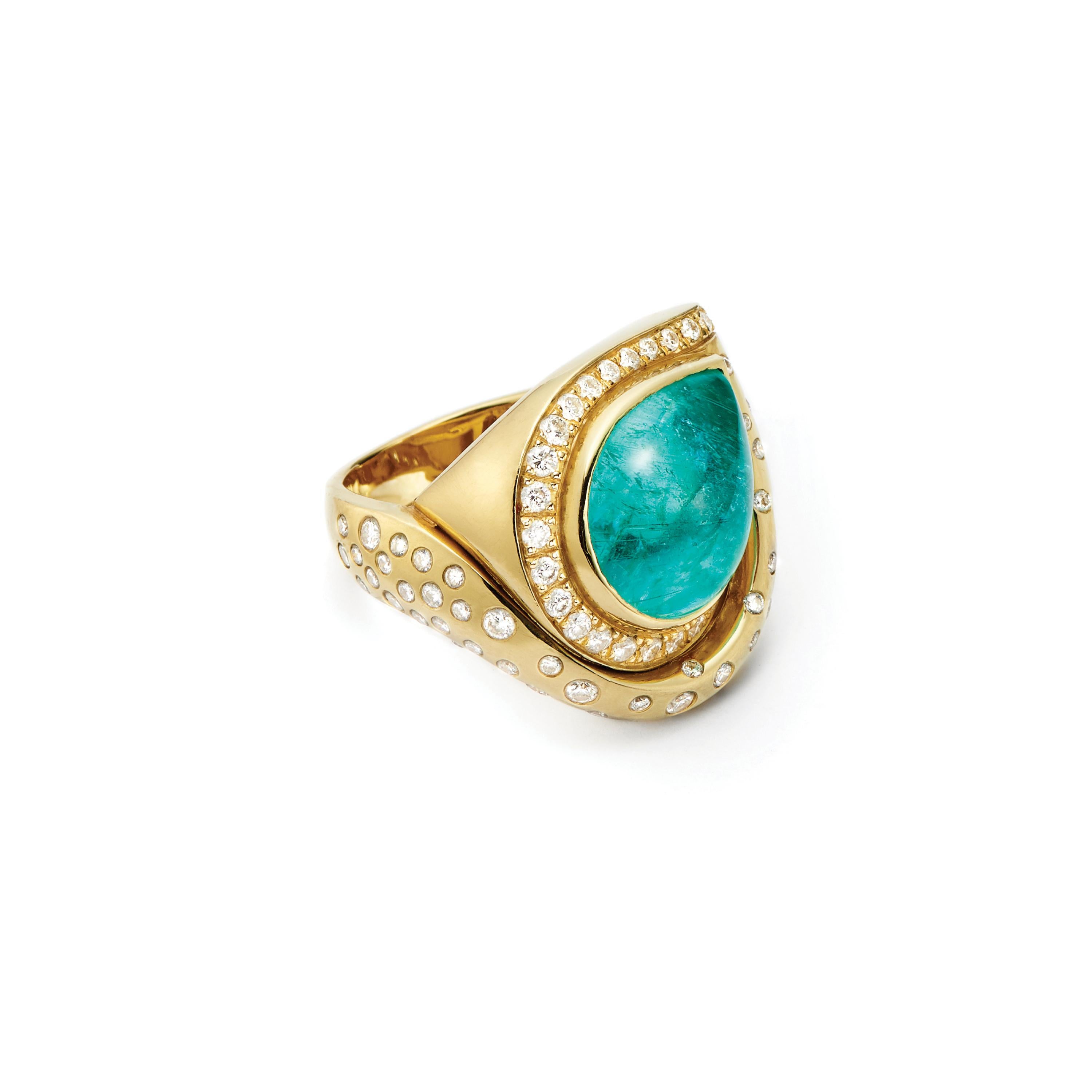 An exquisite and rare 12 Carat Pear-Shaped Cabochon Paraiba Tourmaline (Mozambique) is surrounded by over a carat of brilliant cut Diamonds in a breathtaking swirl design. Set in 18 Karat Gold.

Diamonds: 1.57 Carat FG SI
Paraiba Tourmaline