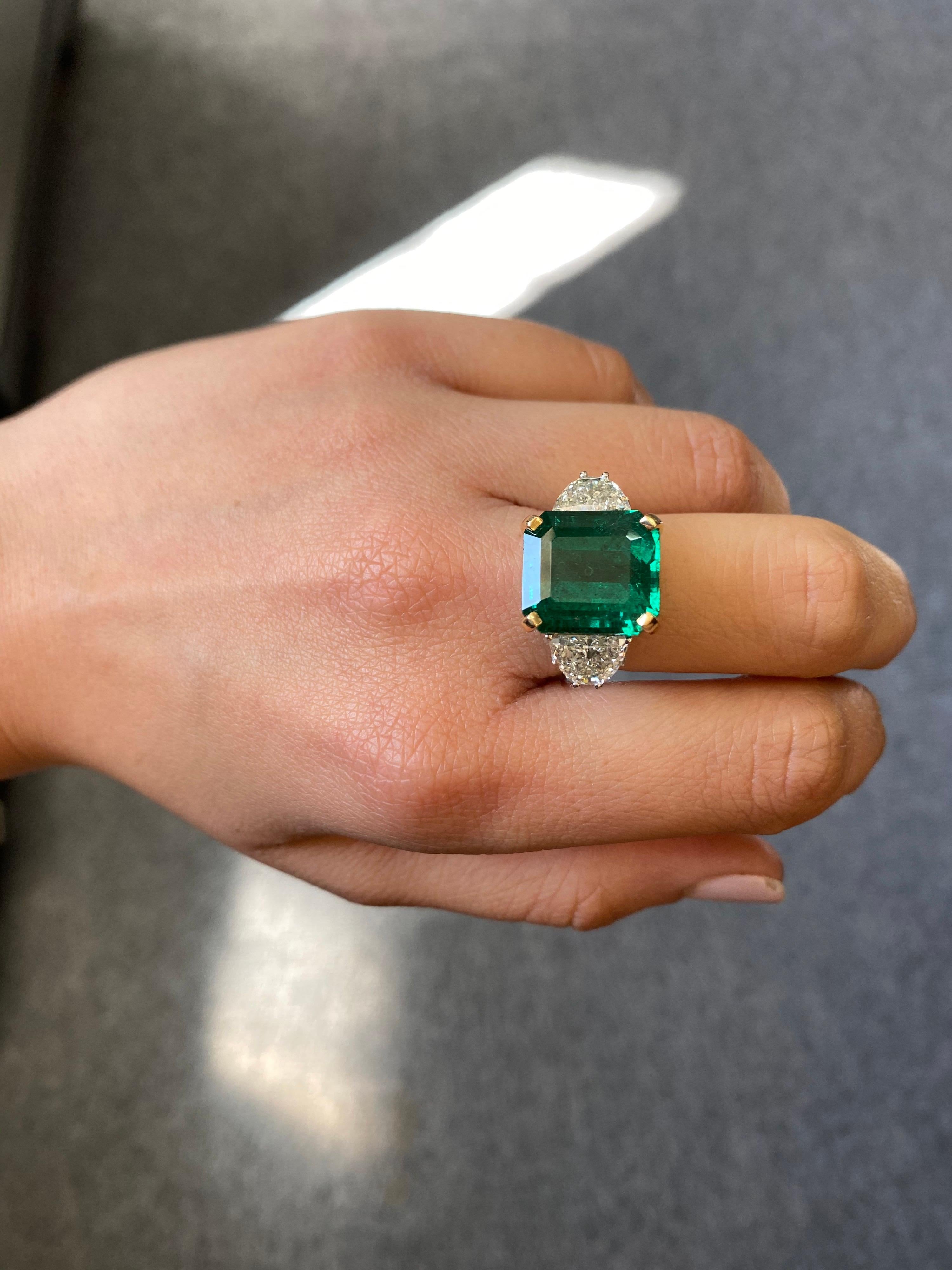 diamond with emerald side stones
