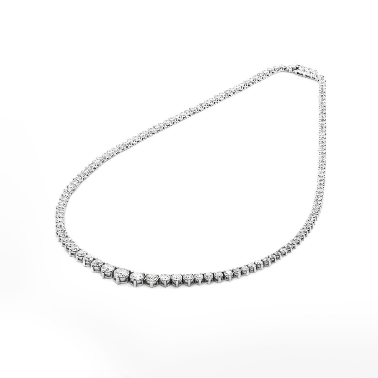 Modern 12.19 carat Platinum Elegant Graduated Diamond Tennis Necklace For Sale