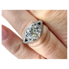 Bague de fiançailles avec diamant central de 1,21ct en or 18KT