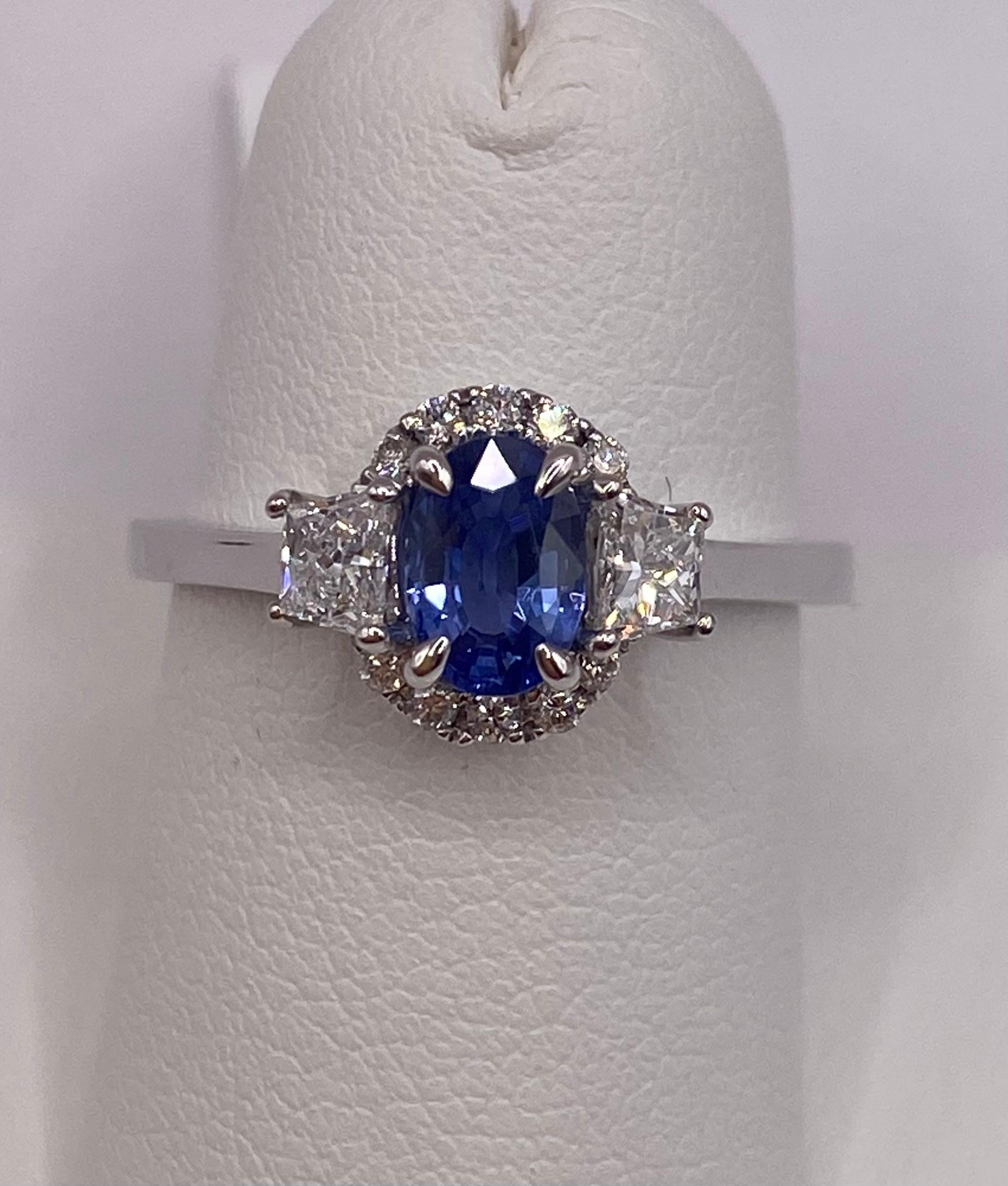 Modern 1.21ctw Oval Sapphire & Trapezoid Diamond Ring in 18KT White Gold For Sale