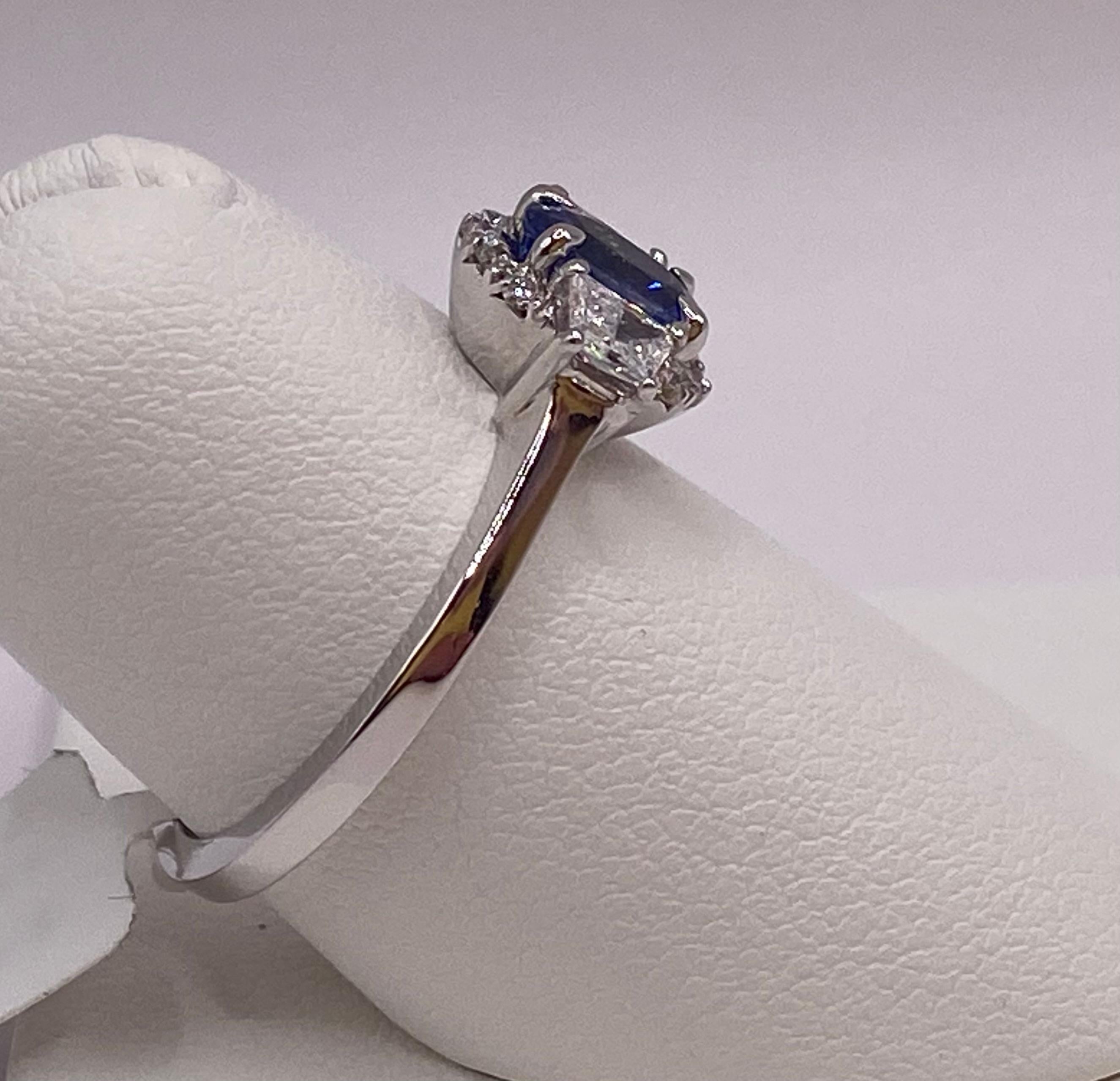 1.21ctw Oval Sapphire & Trapezoid Diamond Ring in 18KT White Gold In New Condition For Sale In New York, NY