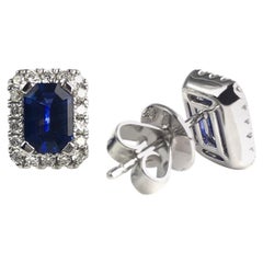 1.22 Carat Emerald Cut Blue Sapphire Earrings with Diamond Halo