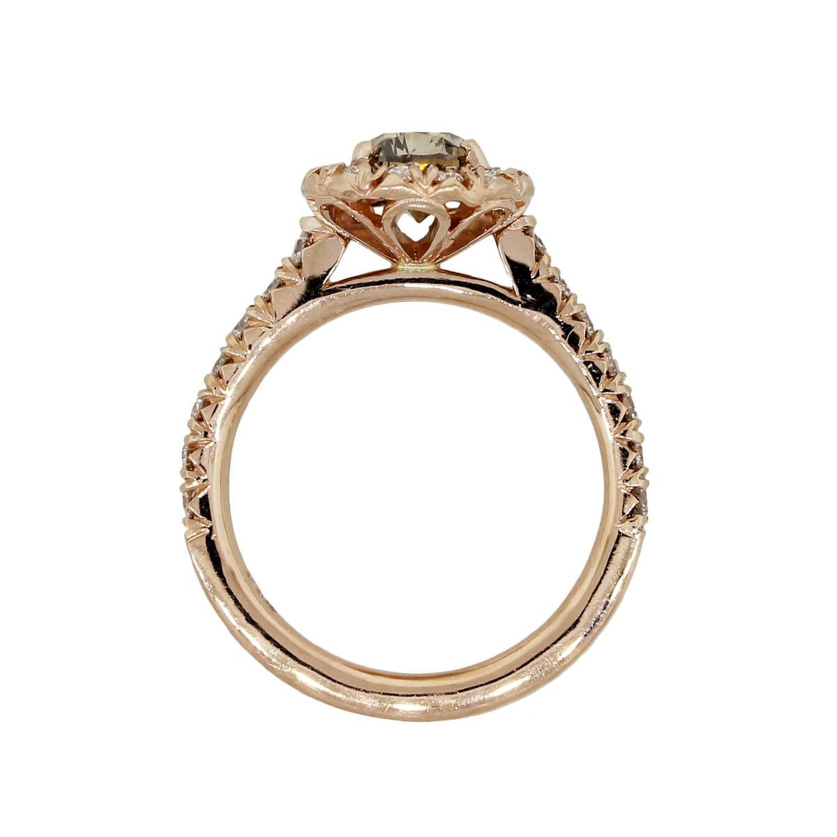 Material: 14k rose gold
Center Diamond Details: Fancy brown diamond approximately 1.22ct. Diamond is brown in color and SI2 in clarity
Additional Diamond Details: Approximately 0.75ctw of round brilliant diamonds.
Ring Size: 6.25 (Can be