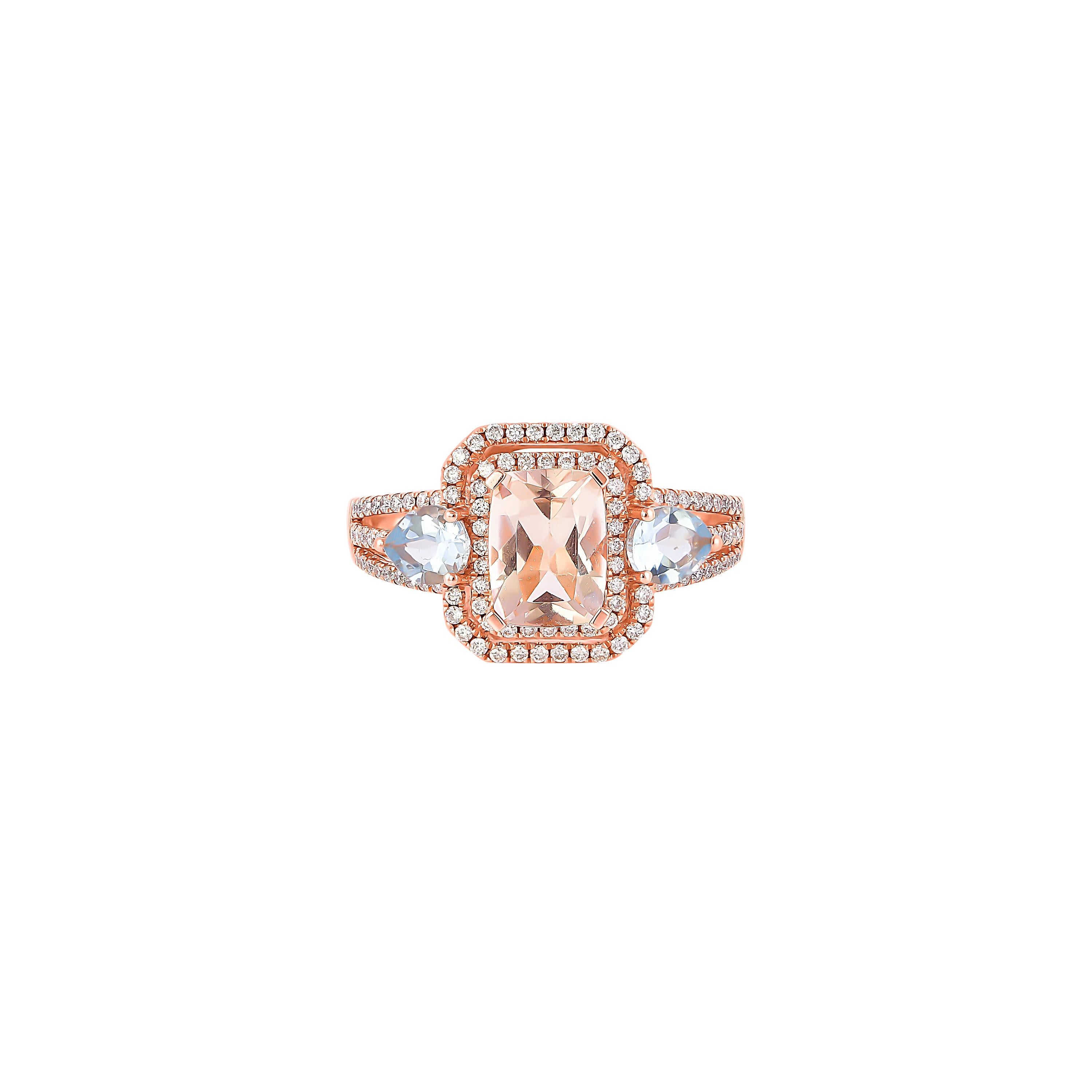 This collection features an array of magnificent morganites! The Morganite in the center is in classic Cushion Shape while the Aquamarine stone on either side is in Pear Shape. Accented with Diamonds these rings are made in rose gold and present a