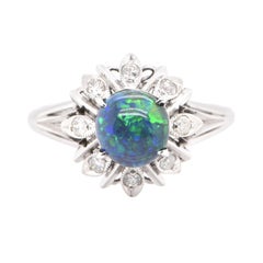 Vintage 1.22 Carat, Natural, Black Opal and Diamond Edwardian-Style Ring Set in Platinum