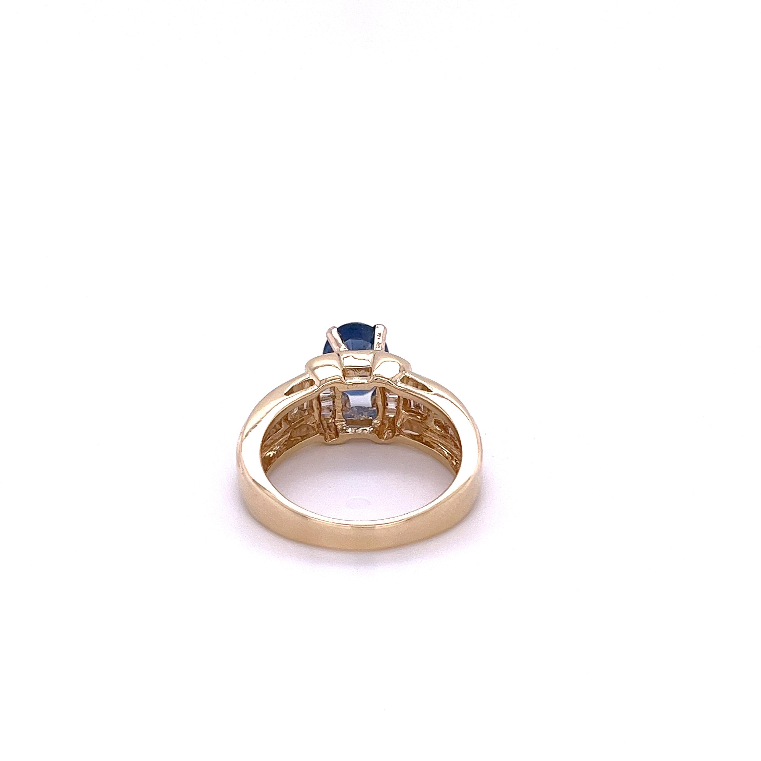 1.22 Carat Oval Cut Blue Sapphire with Baguette Cut Diamond in 14k Gold Ring For Sale 1