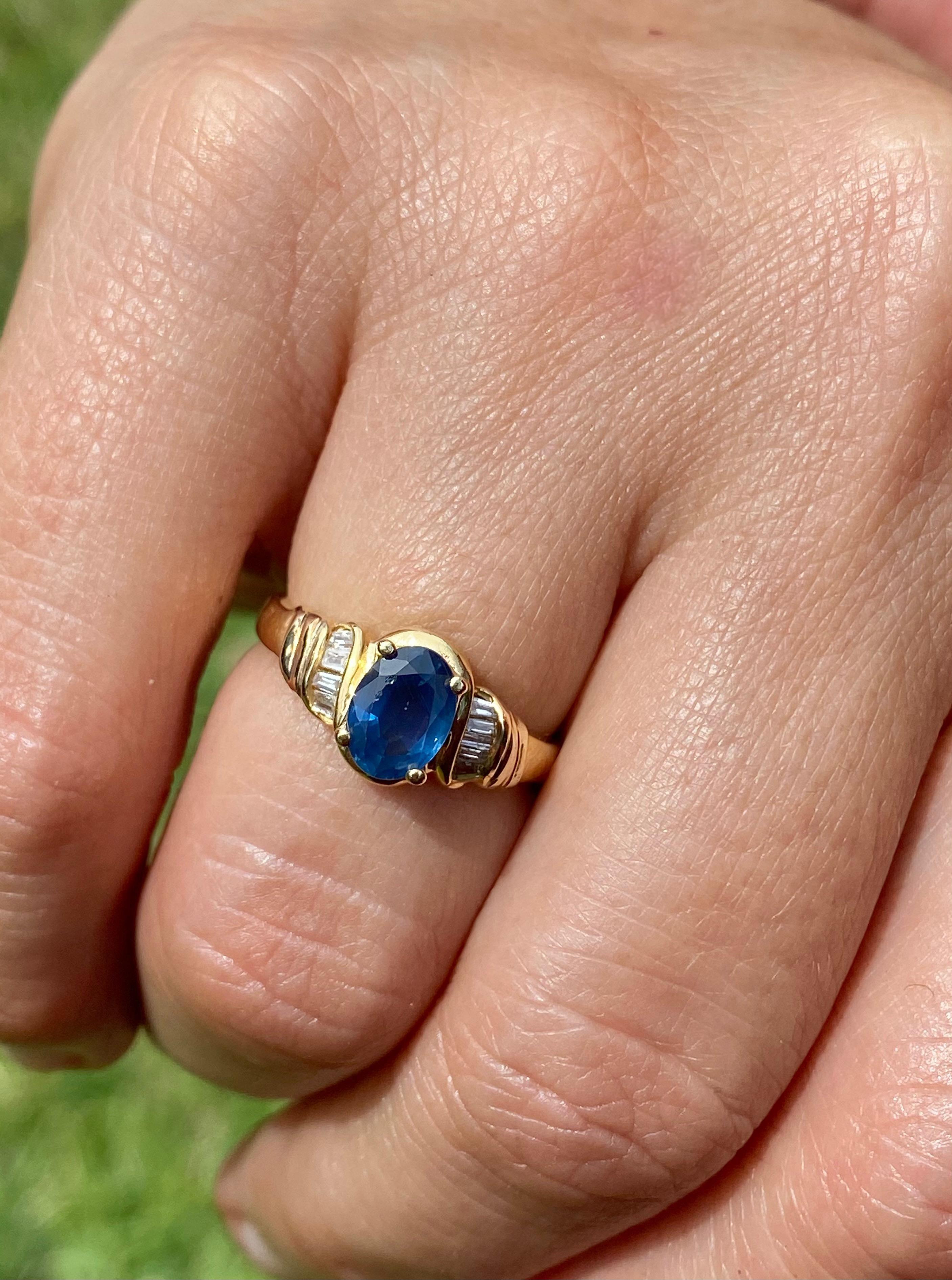 Centering a 1.22 Carat Oval Cut Ceylon (Sri Lanka) Sapphire, accented by 8 Round-Brilliant Cut Diamonds totaling 0.14 Carats, and set in 18K Yellow Gold.

Details:
✔ Gold Karat: 14K 
✔ Sapphire Weight: 1.22 carats
✔ Sapphire Origin: Ceylon (Sri