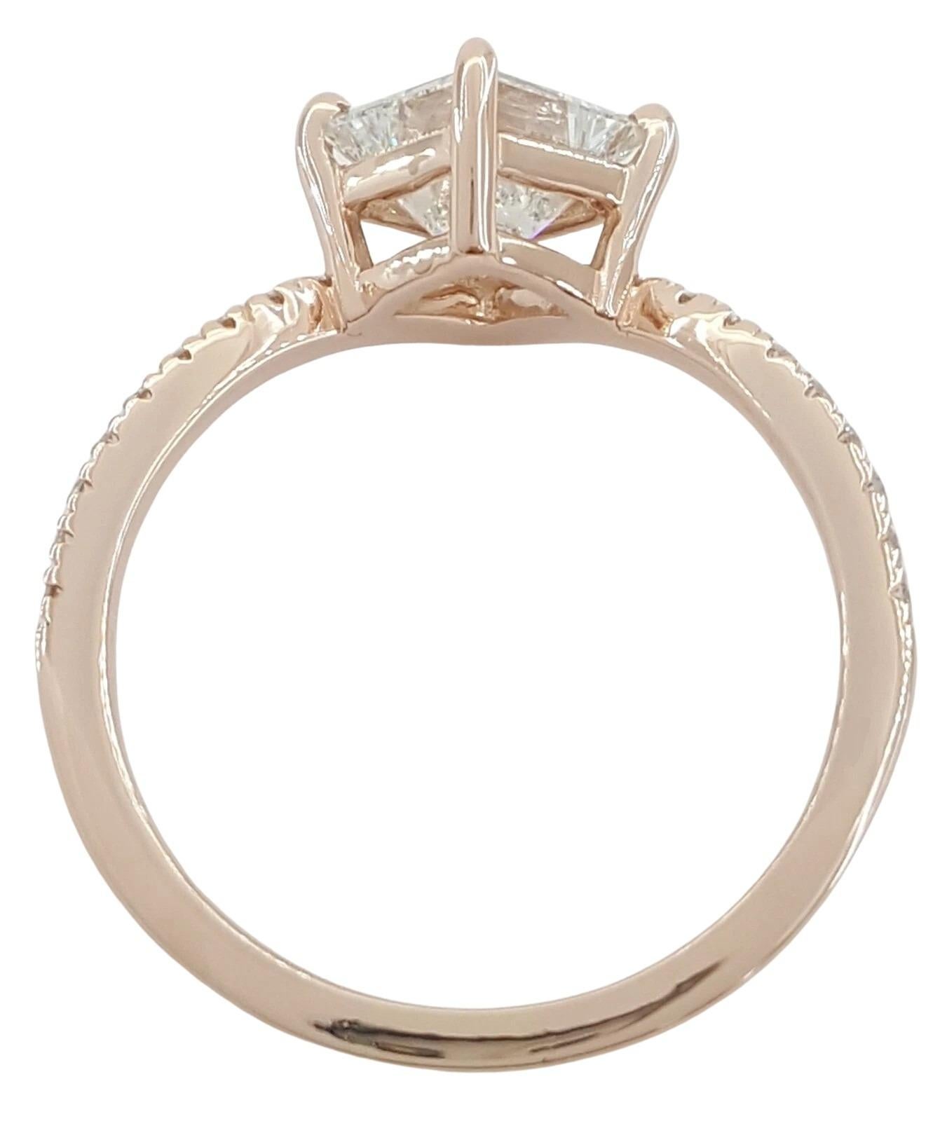 This elegant engagement ring features a dazzling 1.02 carat natural princess brilliant cut diamond at its center, certified by GIA. Graded F color and VVS2 clarity, the center stone is exceptionally clean and bright, with an Ideal Cut that maximizes