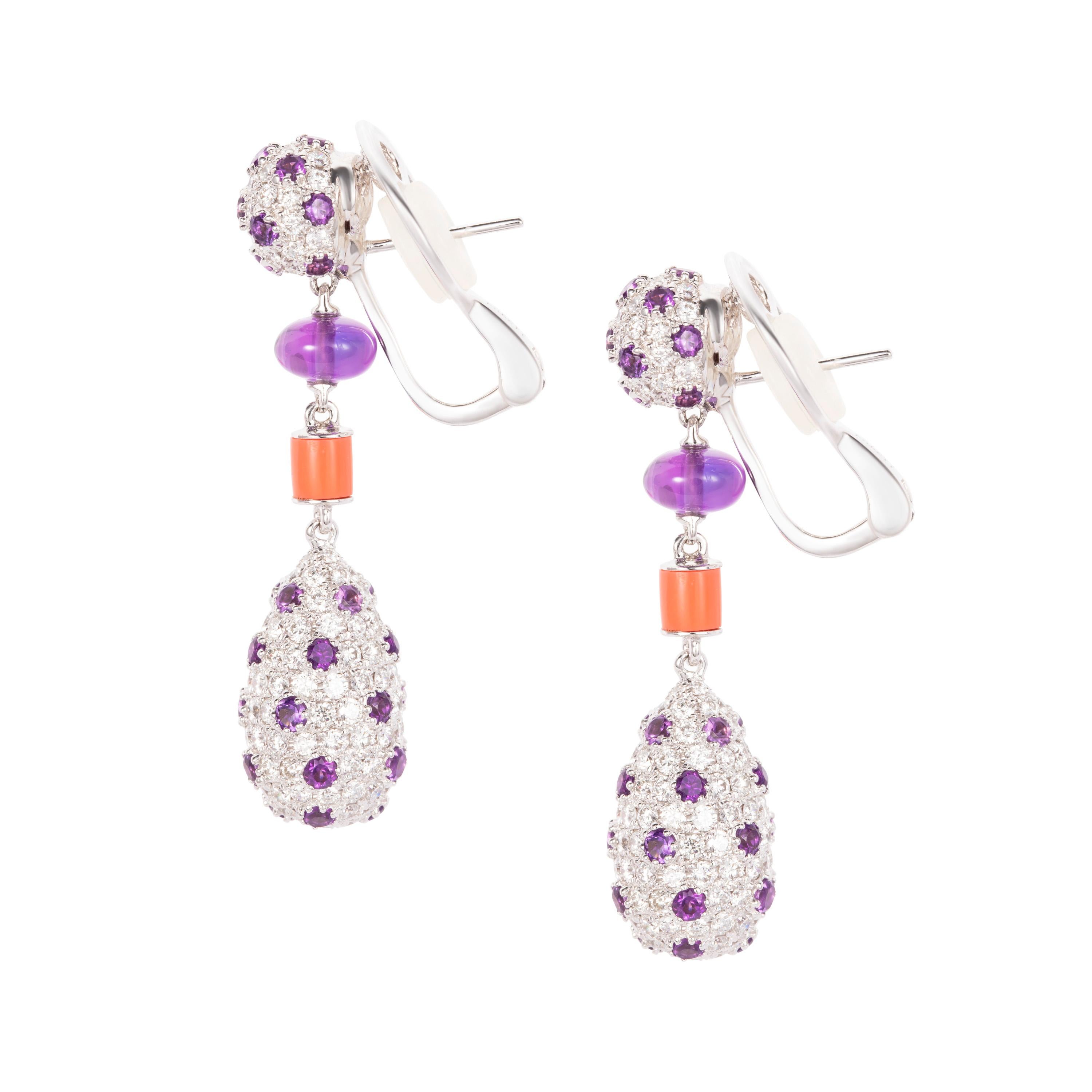 Butani's one-of-a-kind drop earrings are made from 18K white gold that is pavé encrusted with 5.20 white diamonds and 3.07 carats of purple amethyst.  Two amethyst beads (totaling 3.05 carats) and two coral beads (totaling 0.89 carats) sit at the