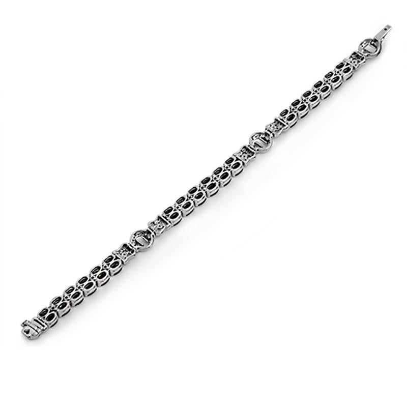 Women's 12.22 Carat Blue Sapphires 0.72 Carat Diamonds 18 Karat White Gold Bracelet For Sale