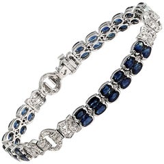 12.22 Carat Blue Sapphires 0.72 Carat Diamonds 18 Karat White Gold Bracelet