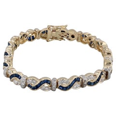 12.23ctw Diamante Zafiro Azul Pulsera Tejida Oro Amarillo 18k 7.25" 6.5mm
