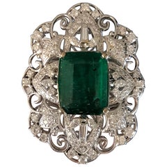 12.bague cocktail en or 18 carats avec émeraude 24 carats et diamant