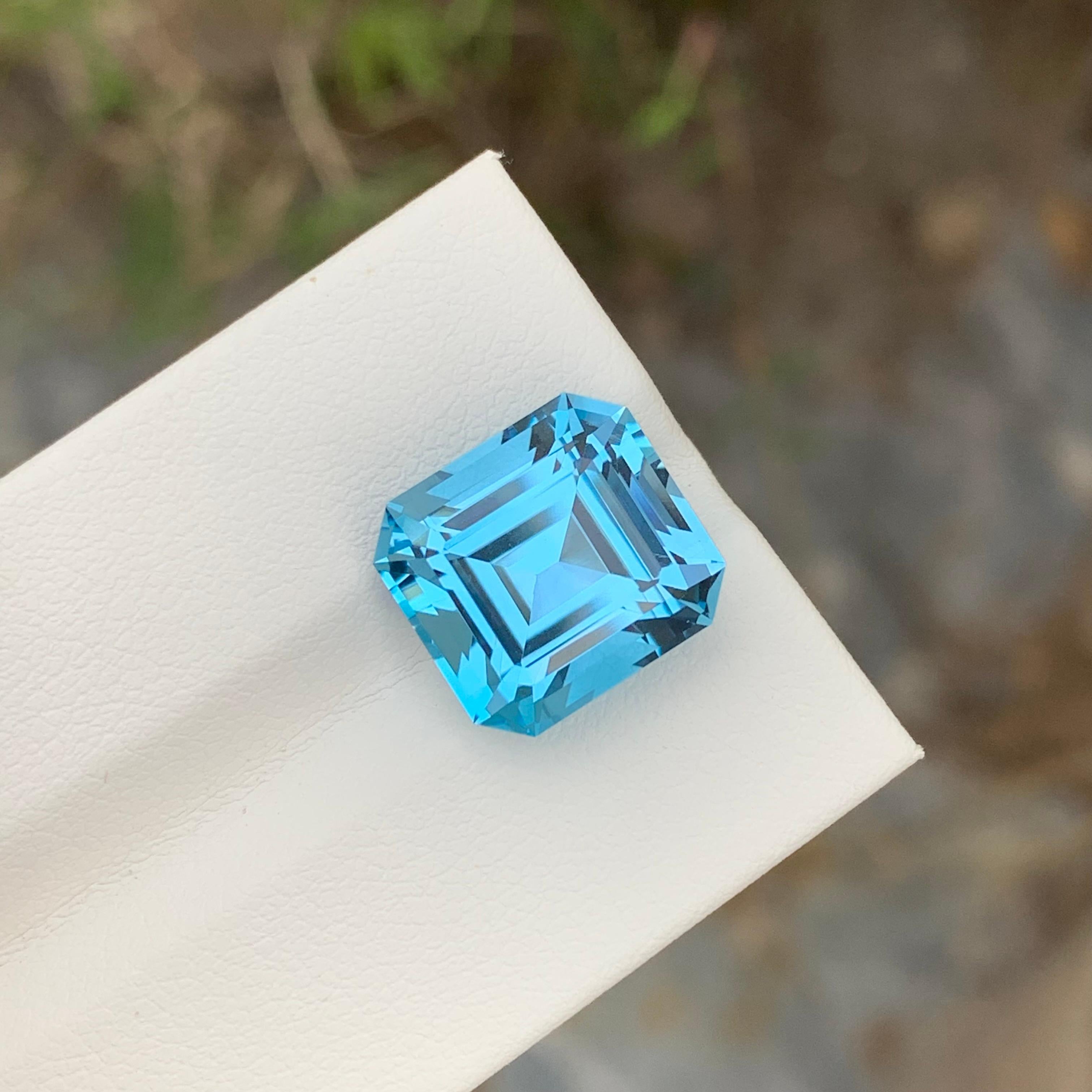 Loose Blue Topaz
Weight: 12.25 Carats
Dimensions: 13 x 12 x 8.9 Mm
Origin: Brazil
Shape: Asscher 
Color: Blue
Certificate: On Demand

Benefits Of Wearing Blue Topaz Stone:
It helps to improve communication and self-expression.
It provides inner