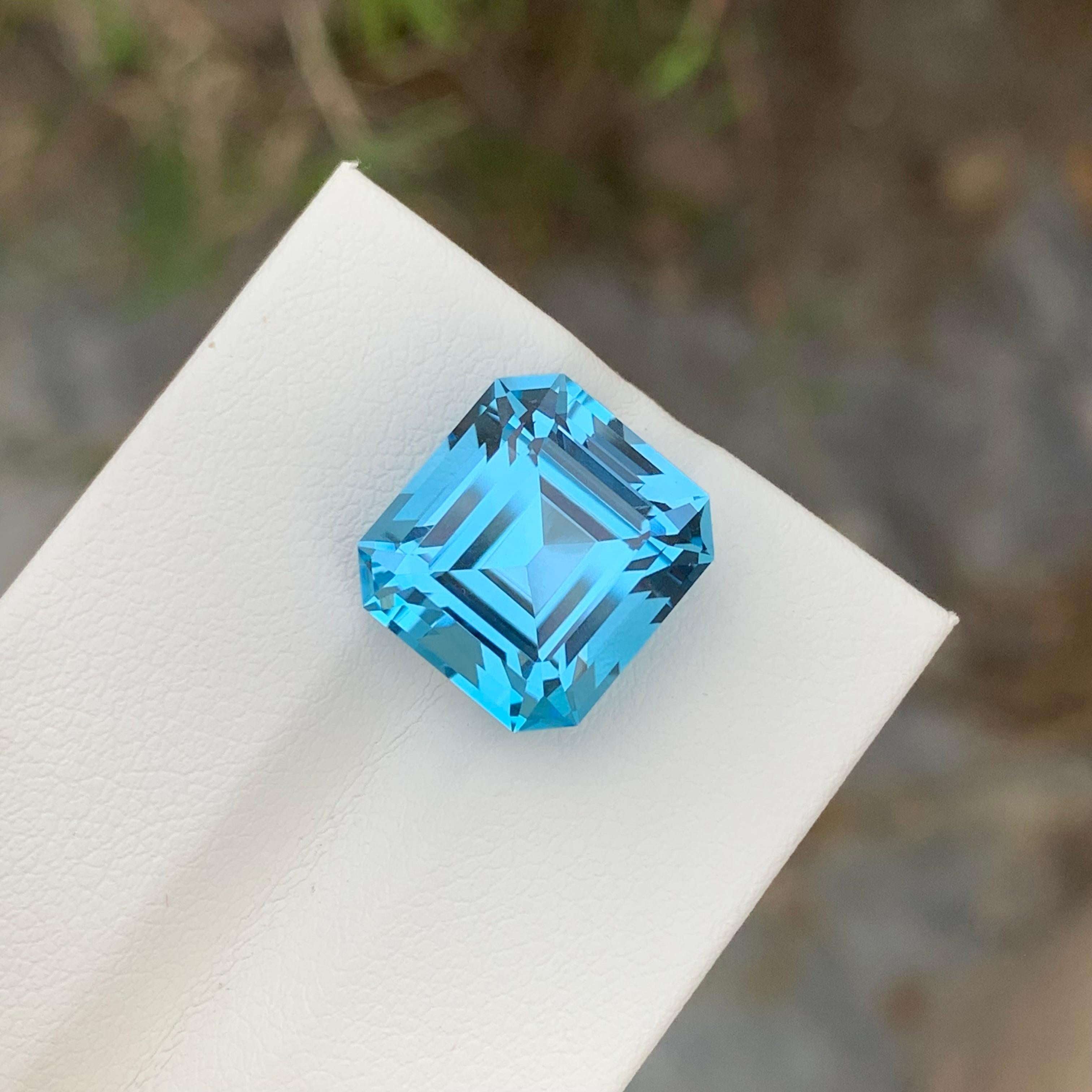 Women's or Men's 12.25 Carat loose Blue Topaz Asscher Cut Gem For Necklace Jewellery For Sale
