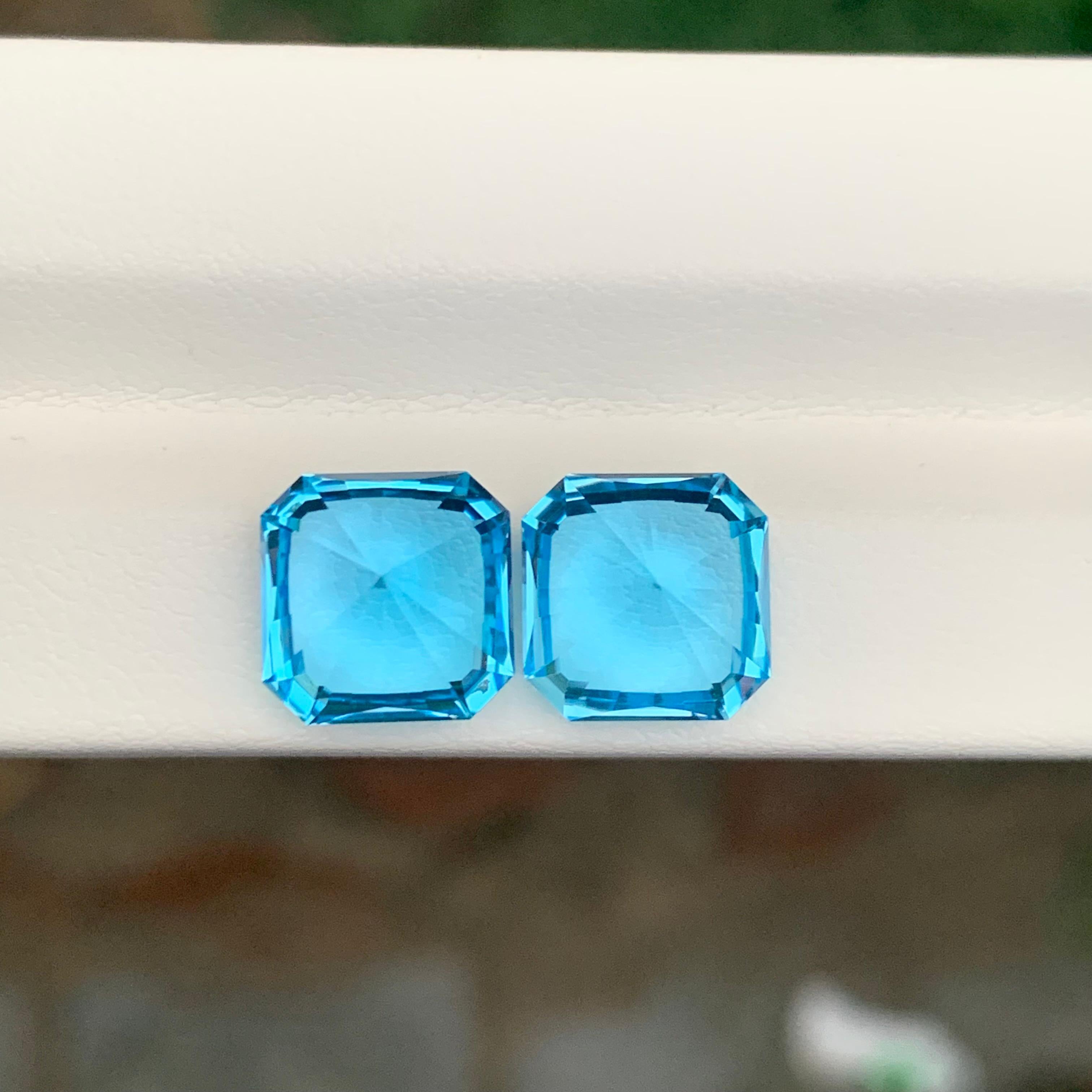 Women's or Men's 12.25 Carat Natural Loose Swiss Blue Topaz Pair Square Cut Gemstone For Sale