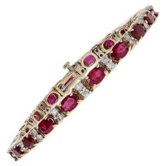 12.26 Carat Oval Cut Burmese Ruby and Diamond Bracelet 14 Karat Gold Link