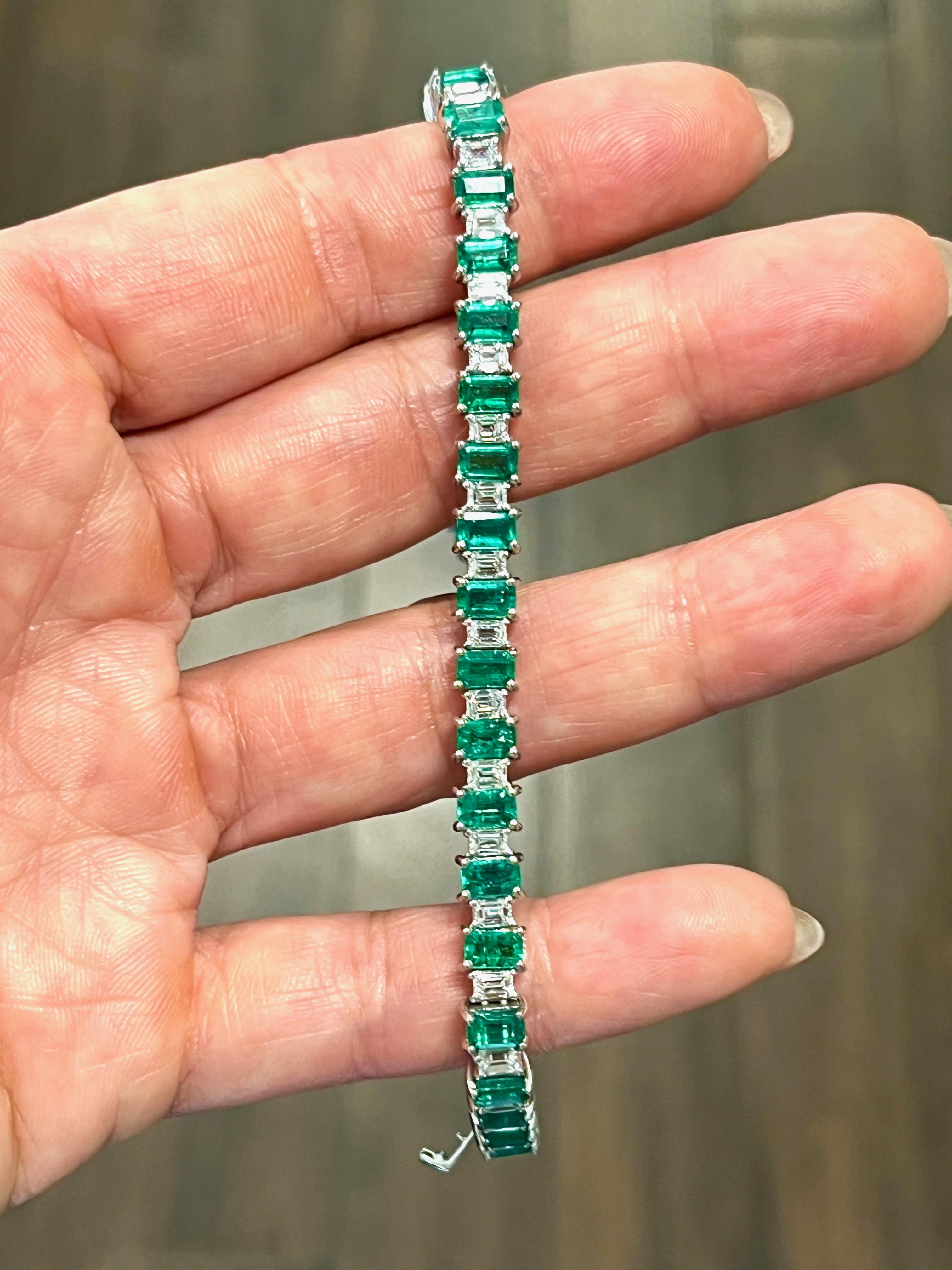 This bracelet features 31 natural emerald cut emeralds weighing 8.71 ct. The bracelet also features 31 baguette-shaped diamonds weighing 3.55 ct and are graded E/F in color and VVS2/VS1 in clarity. The bracelet is 7 inches long and is set in