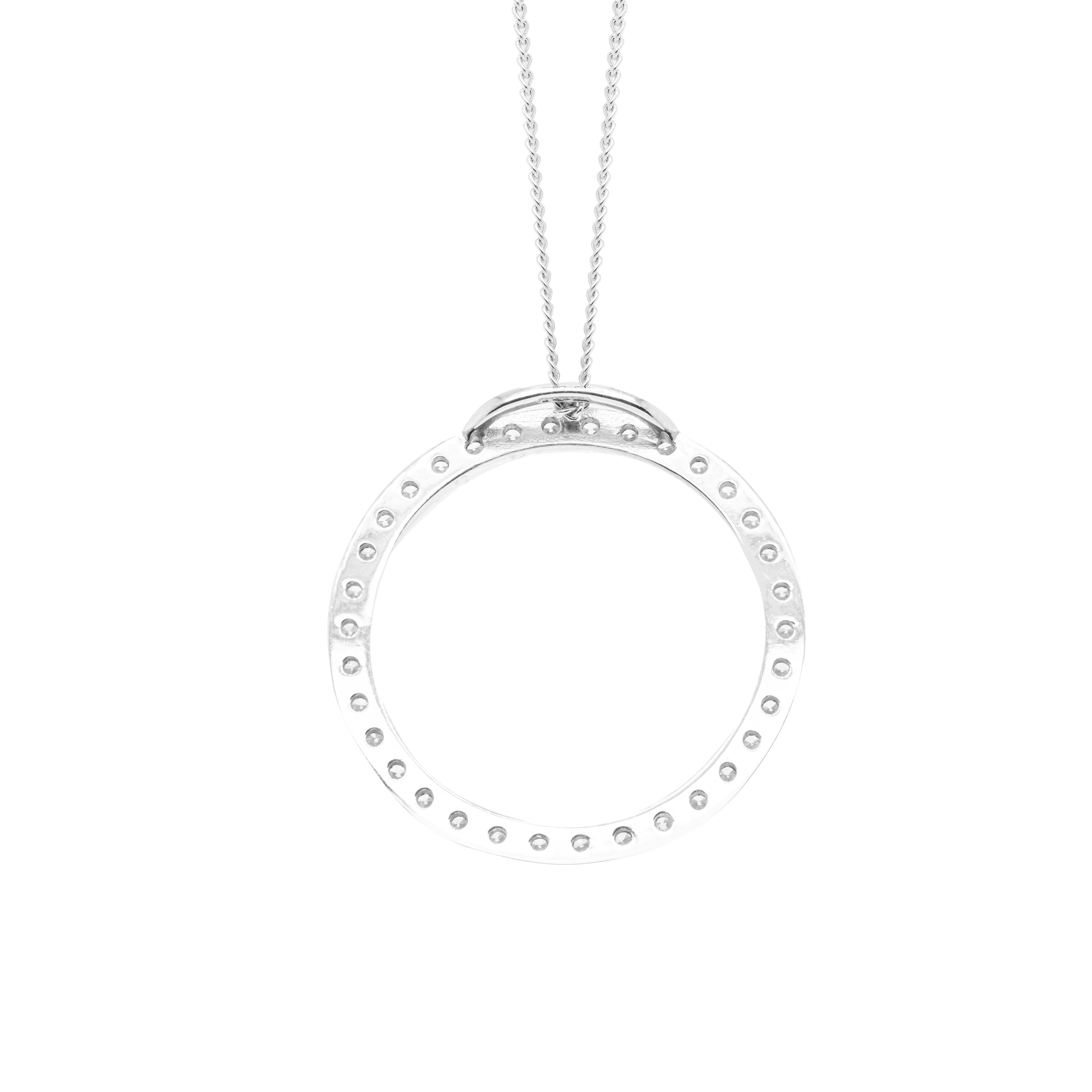 This gorgeous necklace features a diamond set circle pendant measuring 26mm in diameter. The pendant is beautifully inlaid with 34 fine quality round brilliant cut diamonds coming to a total weight of 1.22ct set in platinum.  The circle hangs from a