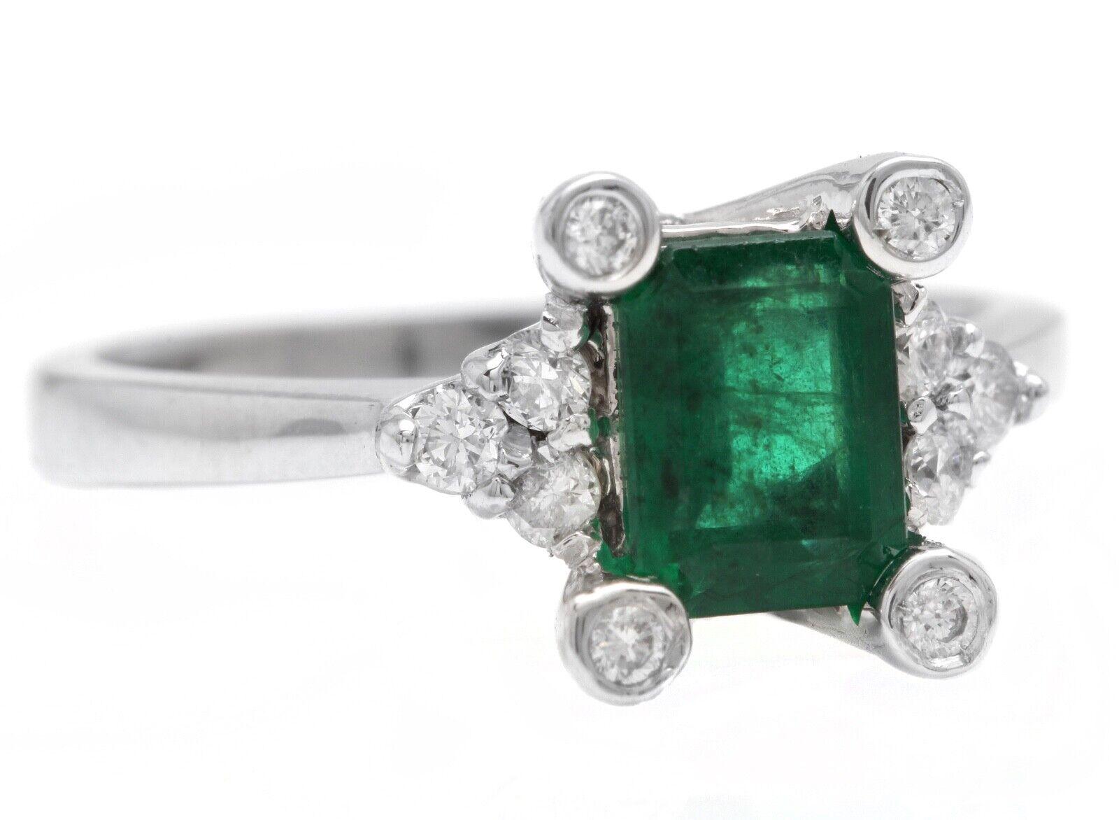 1.22 Carats Natural Emerald and Diamond 14K Solid White Gold Ring

Suggested Replacement Value: $2,500.00

Total Natural Green Emerald Weight is: Approx. 1.00 Carats 

Emerald Measures: Approx. 6.70 x 5.07mm

Natural Round Diamonds Weight: Approx.