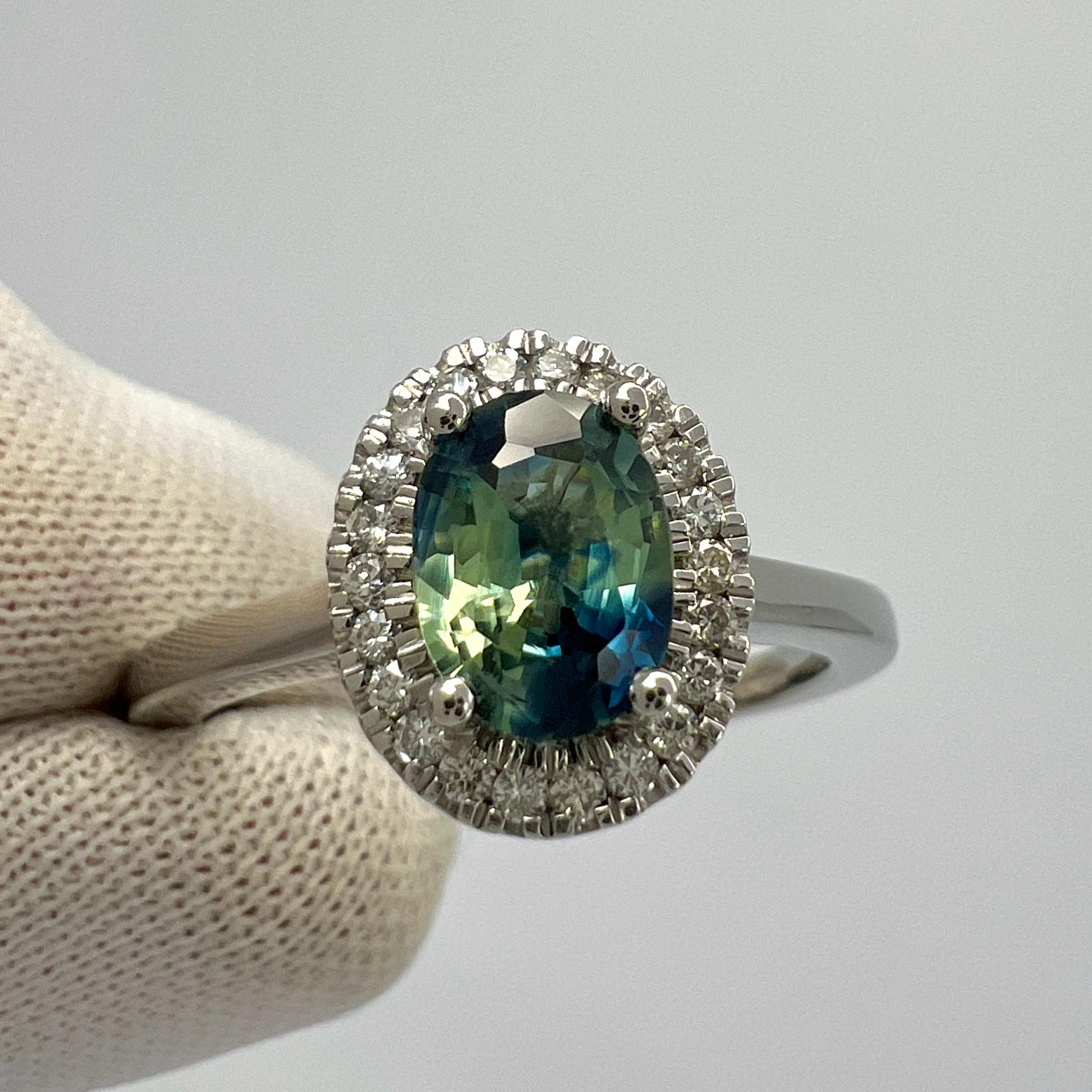 Unique Parti Colour Sapphire And Diamond Platinum Halo Ring. 1.22 Carat total.

This beautiful ring features a 1.08ct sapphire with a stunning blue and yellow green parti colour effect. Unique gemstone. This also has an excellent oval cut and