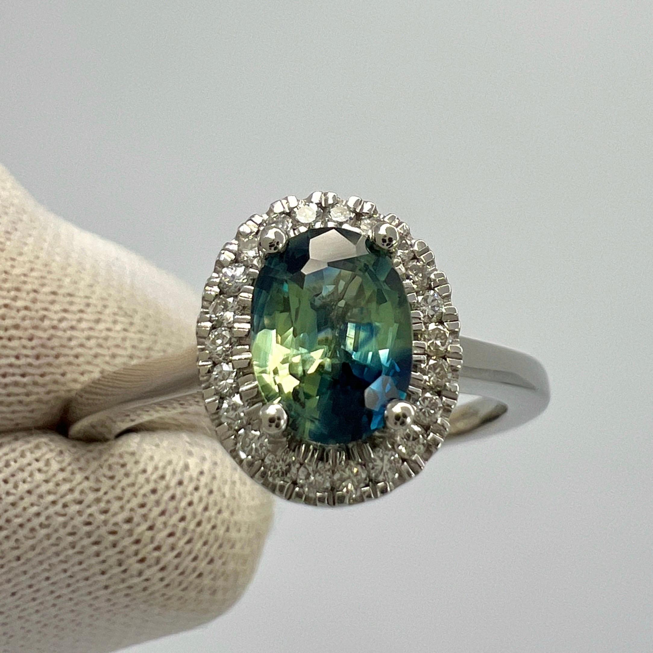 Women's or Men's 1.22ct Parti Bi Colour Oval Cut Blue Green Sapphire & Diamond Platinum Halo Ring For Sale