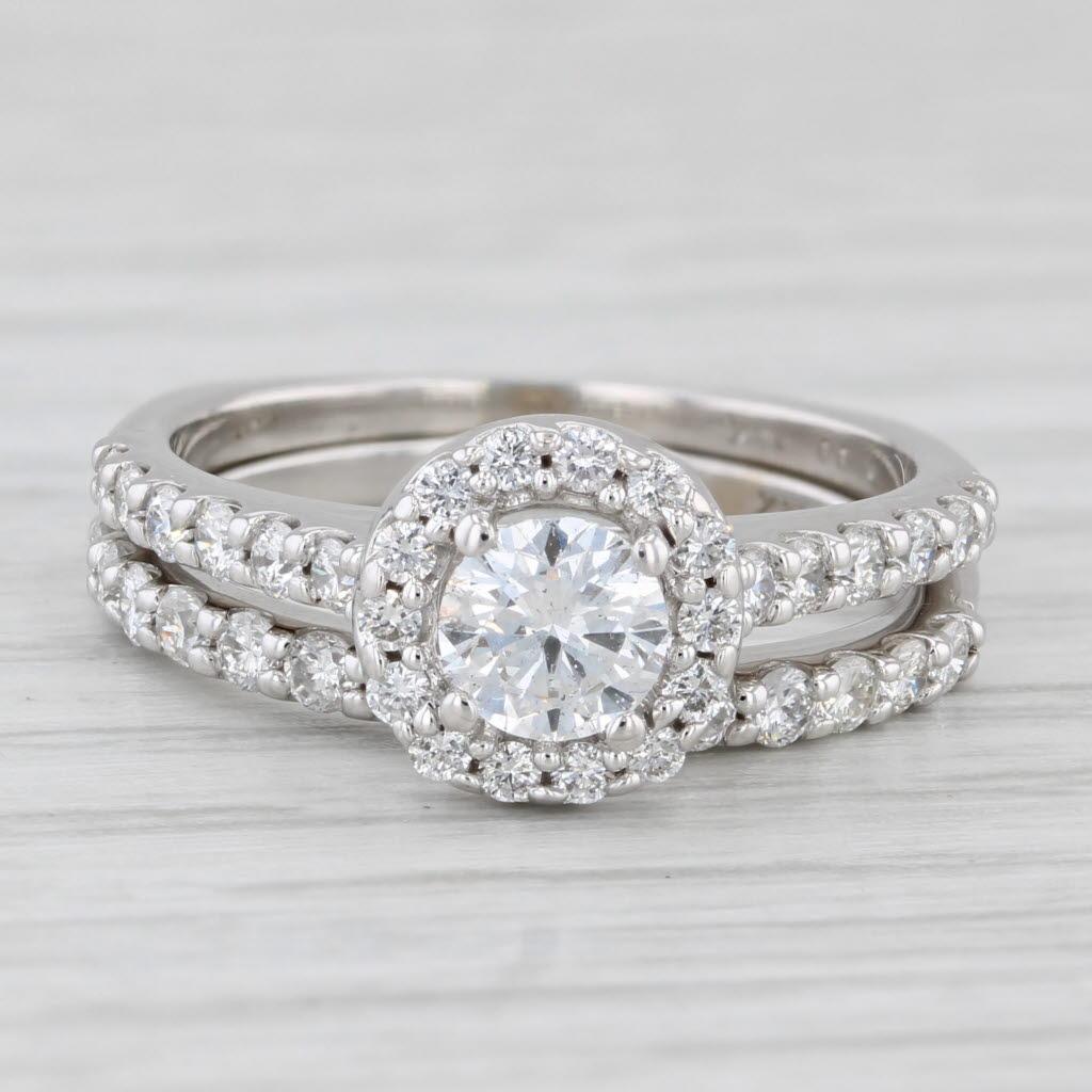 Gemstone Information: 
- Natural Diamonds -
Total Carats - 1.22ctw (0.45ct center, 0.41ctw accents, 0.36ctw band)
Cut - Round Brilliant
Color - F - G
Clarity - SI1 - SI2

Metal: 14k White Gold
Weight: 4.5 Grams 
Stamps: 14k

Set Measurements-
Face