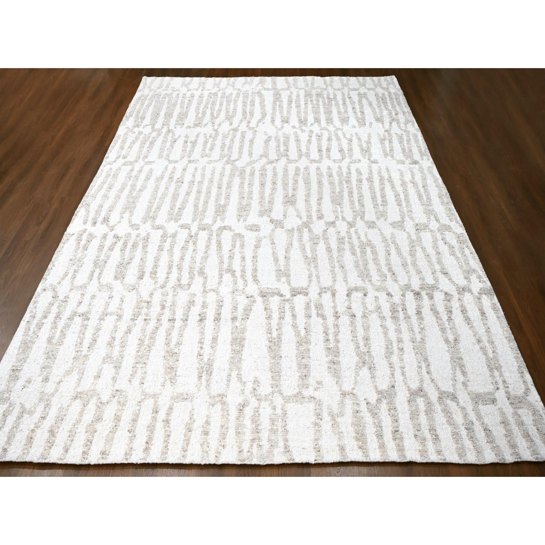 Alabaster White, Minimalist Swedish Design, Hand Knotted, 100% Wool, XL, Oversized, Oriental Rug
Primary materials: Wool
Latex: No Pile 
height: 0.25 Inches
Style: Contemporary
Primary color: Ivory
Secondary colors: Beige, Brown
Pattern: Oriental