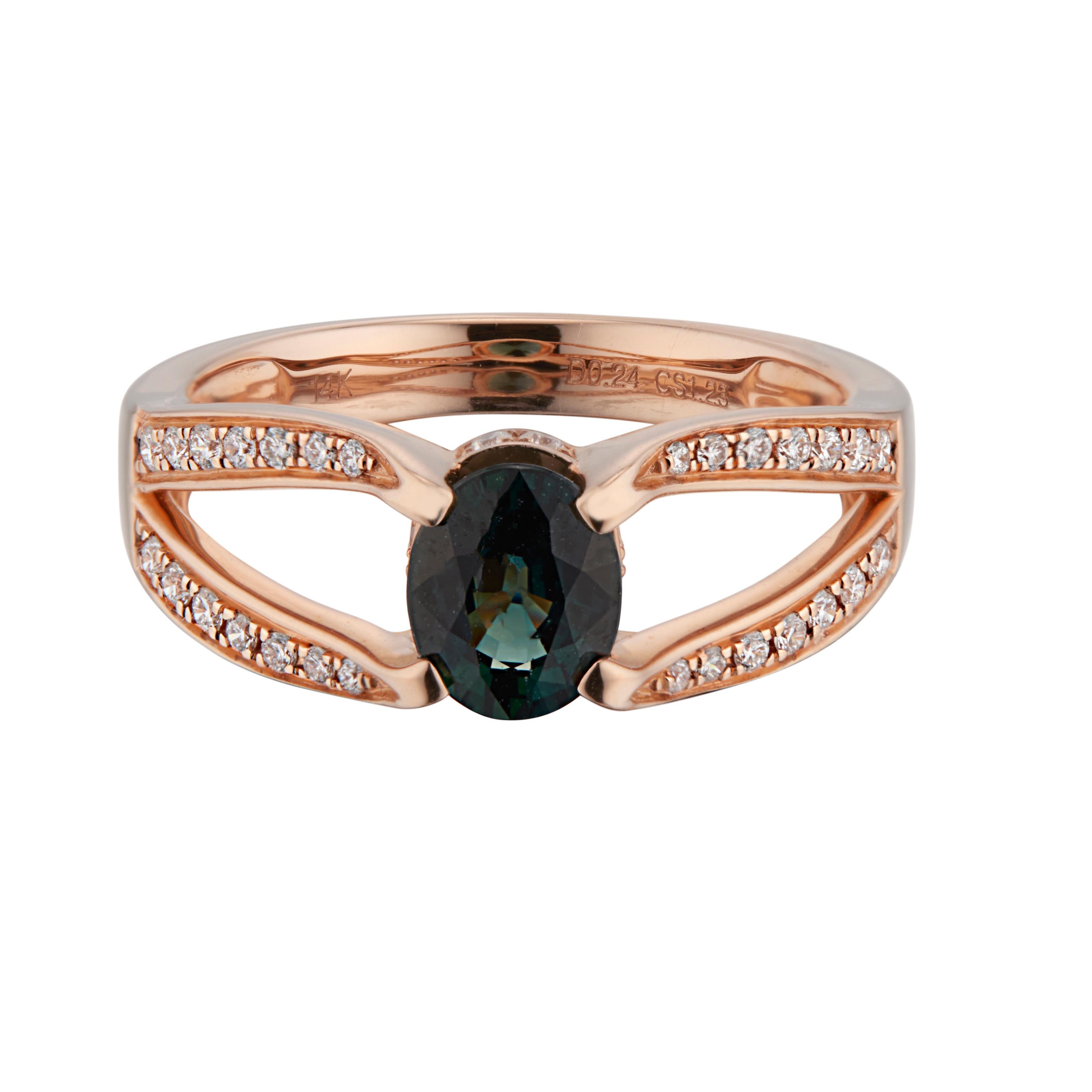 Green and blue sapphire and diamond engagement ring. Oval center sapphire in a 14k rose gold split shank setting with 36 round brilliant cut accent diamonds along both sides of the shank.

1 oval bluish green sapphire, approx. 1.23cts
36 round