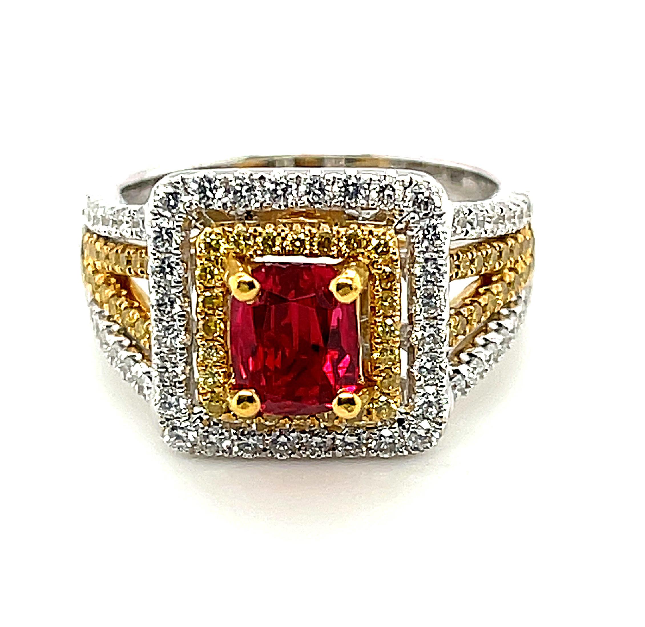 This stunning ring features a red-as-a-Burmese-ruby spinel set with canary yellow diamonds and sparkling white diamonds set in 18k white and yellow gold. The diamonds form a double 
