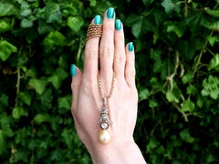 1.23 Carat Diamond and South Sea Pearl Yellow Gold Pendant