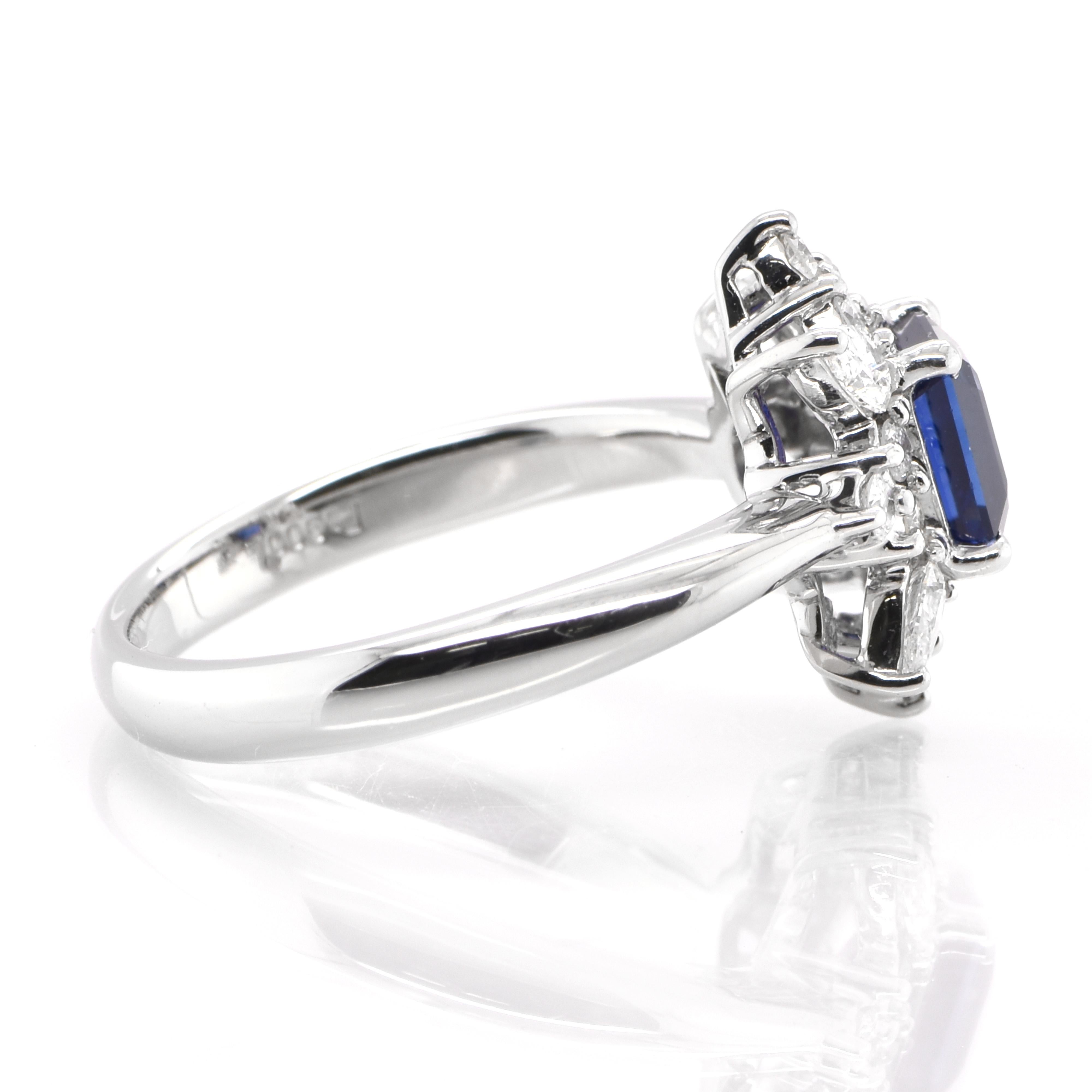 Modern 1.23 Carat Natural Emerald-Cut Sapphire and Diamond Halo Ring Set in Platinum
