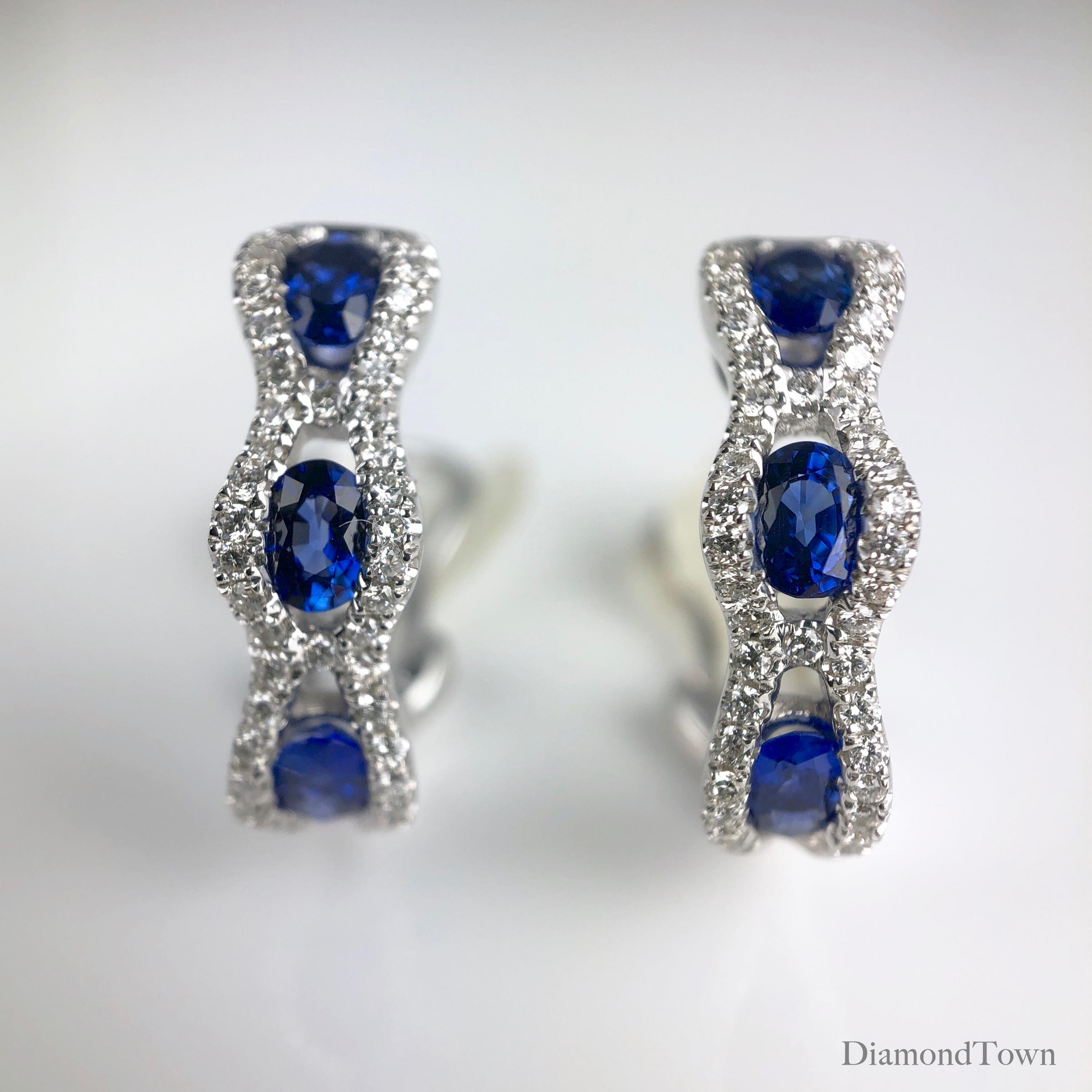 These lever-back stud earrings feature three oval cut vivid blue sapphires each, wrapped in a web of round white diamonds. Total sapphire weight is 1.23 carats. Total diamond weight 0.35 carats.

Set in 18k White Gold.

Many of our items have