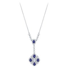Collier pendentif en saphirs bleus et diamants de 1,23 carat de forme ovale en 18K