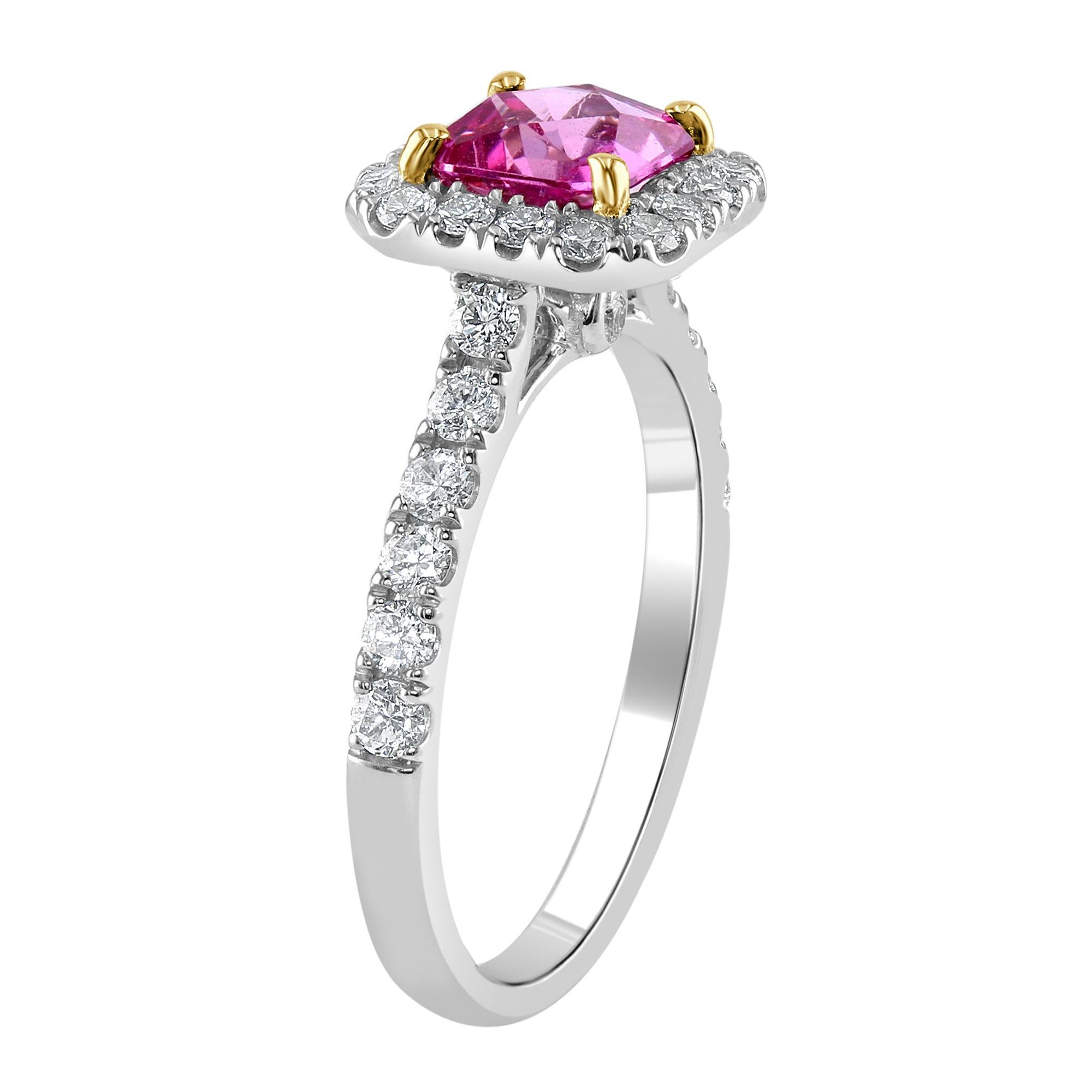 1.23 carat Emerald cut Pink Sapphire, surrounded by 0.66 carat round diamonds.

Set in 18K White Gold, with Yellow Gold Prongs

If you are looking for a classy, feminine and elegant one-of-a-kind engagement ring, this is the perfect piece to make