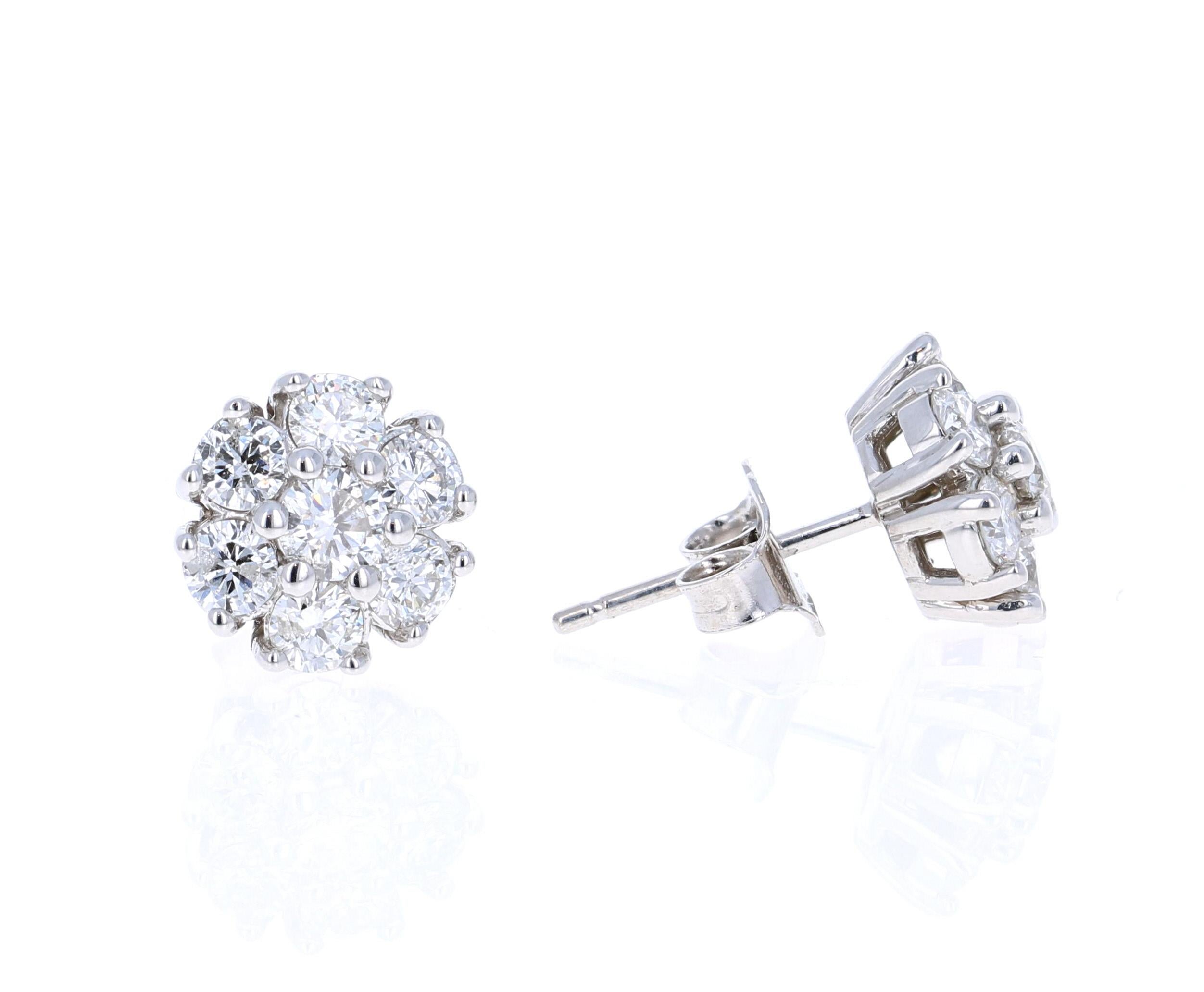 This classic design of diamond earrings has 14 Round Cut Diamonds that weigh 1.23 Carats. Clarity: SI, Color: F

The backing of the earring is a standard push back. The Earrings are made in 14K White Gold and weigh approximately 2.2 grams.

