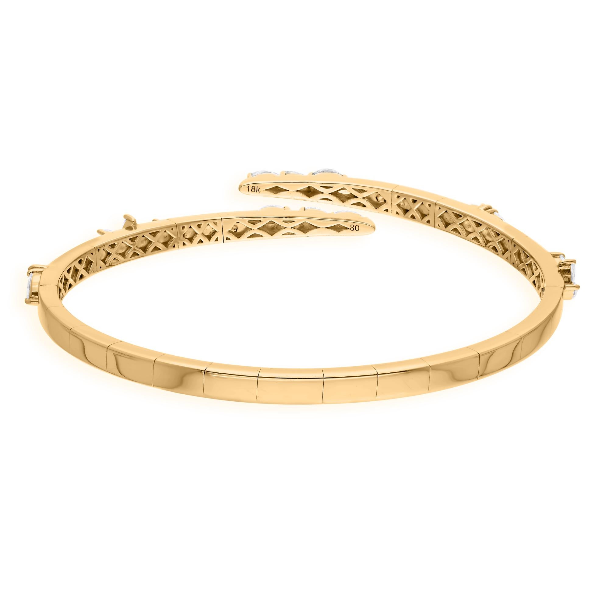 Cast from 18-karat gold, these exquisite bracelet is handset with 1.23 carats of sparkling diamonds.

FOLLOW SPECTRUM JEWELS storefront to view the latest collection & exclusive pieces. Spectrum Jewels is proudly rated as a Top Seller on 1stdibs