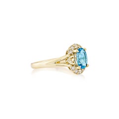 Sunita Nahata 1.23 Carat Swiss Blue Topaz Fancy Ring in 14KYG with Diamond.