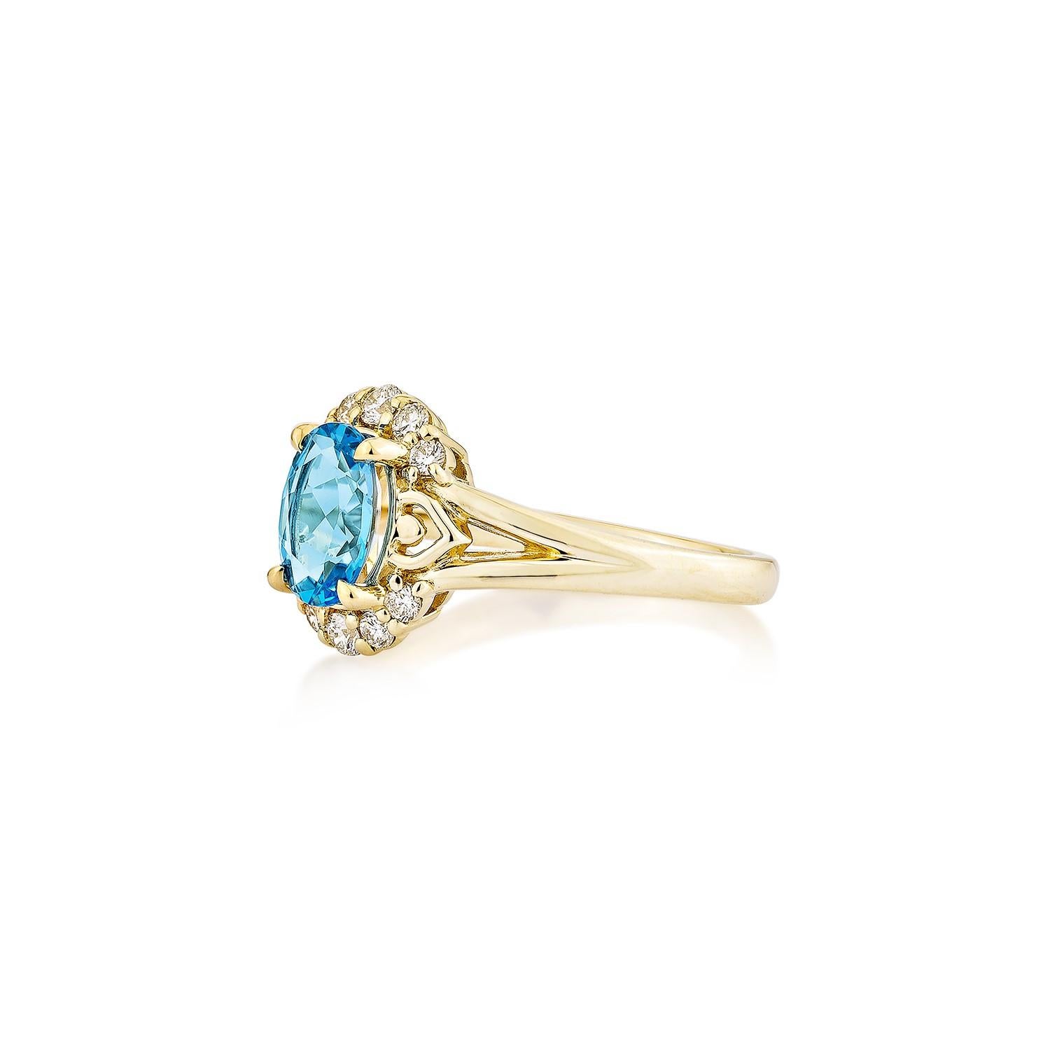 Oval Cut Sunita Nahata 1.23 Carat Swiss Blue Topaz Fancy Ring in 14KYG with Diamond. For Sale