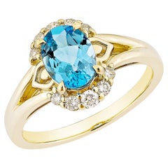 1.23 Carat Swiss Blue Topaz Fancy Ring in 14Karat Yellow Gold with Diamond.