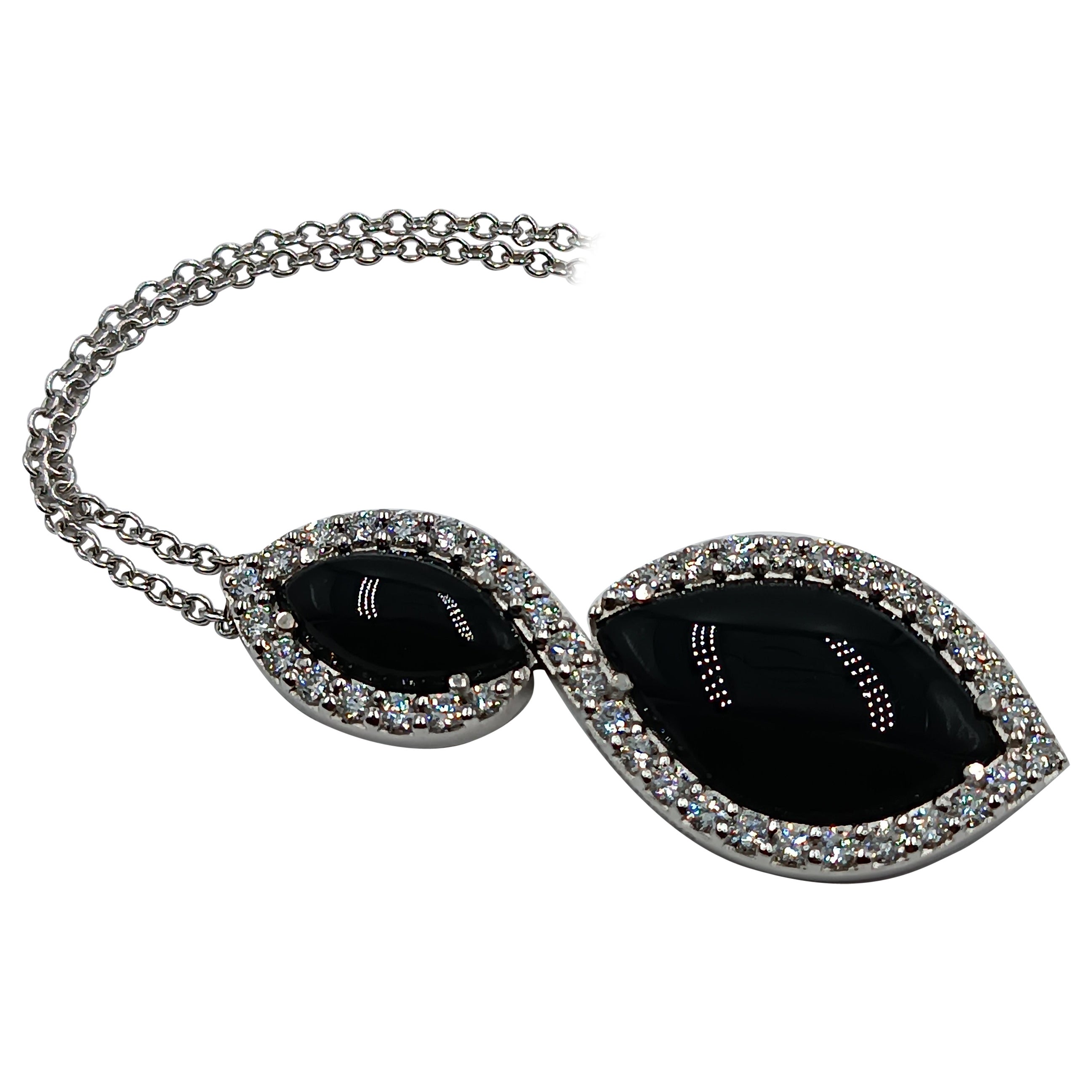 1.23 Carat VS G Diamonds on 18 Carat White Gold and Onyx Pendant For Sale