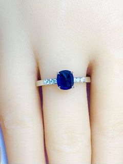 1.23 Ct Kashmir Sapphire Royal blue Sugarloaf gemstone with diamonds ring