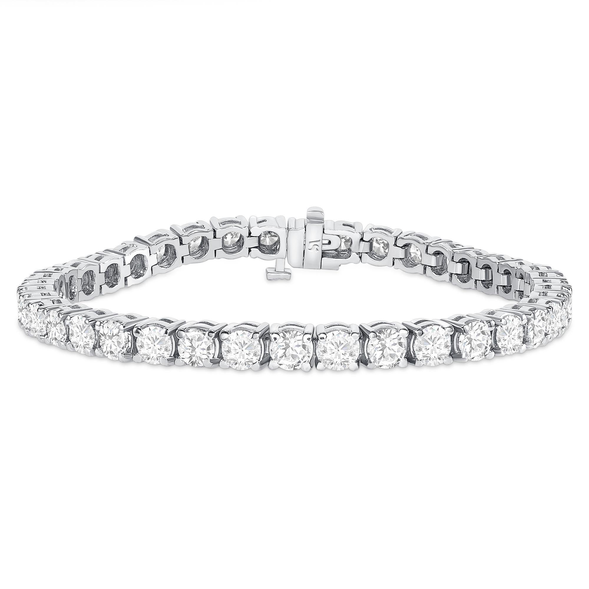 12.30 tcw 14k Gold Diamond Tennis Bracelets 

Wrap your wrist in this stunning tennis bracelets incomparable brilliance from round diamonds. Set in 14K solid gold, this beautiful natural diamond bracelet features a secure clasp so you can wear it on