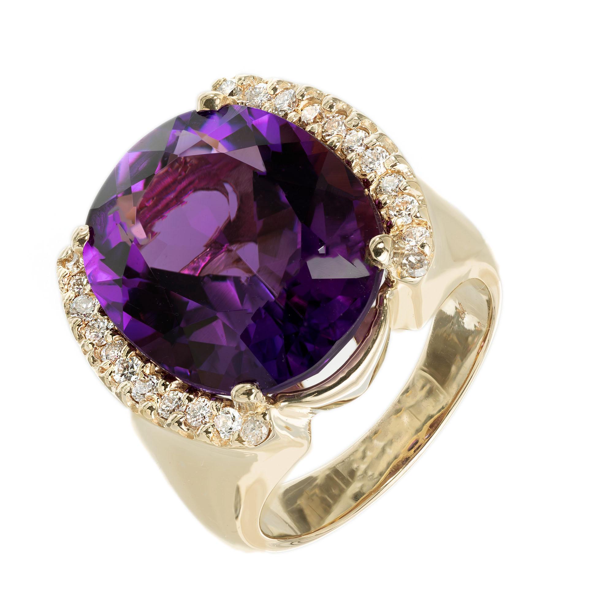 Amethyst and diamond cocktail ring. 12.31ct oval center amethyst with a half halo of diamonds in a 14k yellow gold cocktail ring setting. Circa 1970's. 

1 oval purple amethyst, VS2 approx. 12.31cts
22 round brilliant cut diamonds, H-I VS approx.