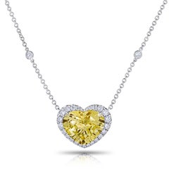 12.31 Carat Heart Shaped Yellow Sapphire and  Diamond Platinum Pendant